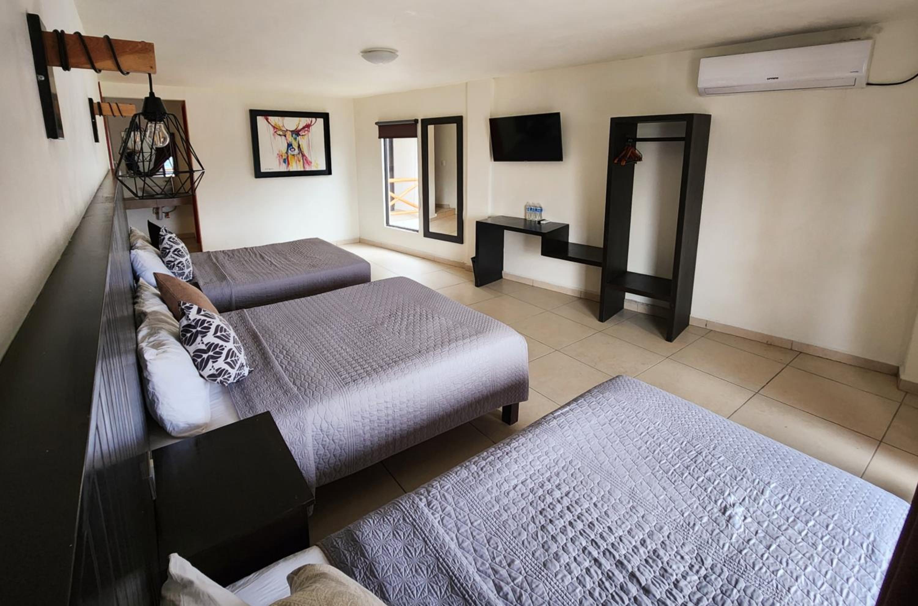 Triple Room with Balcony - Photo 1