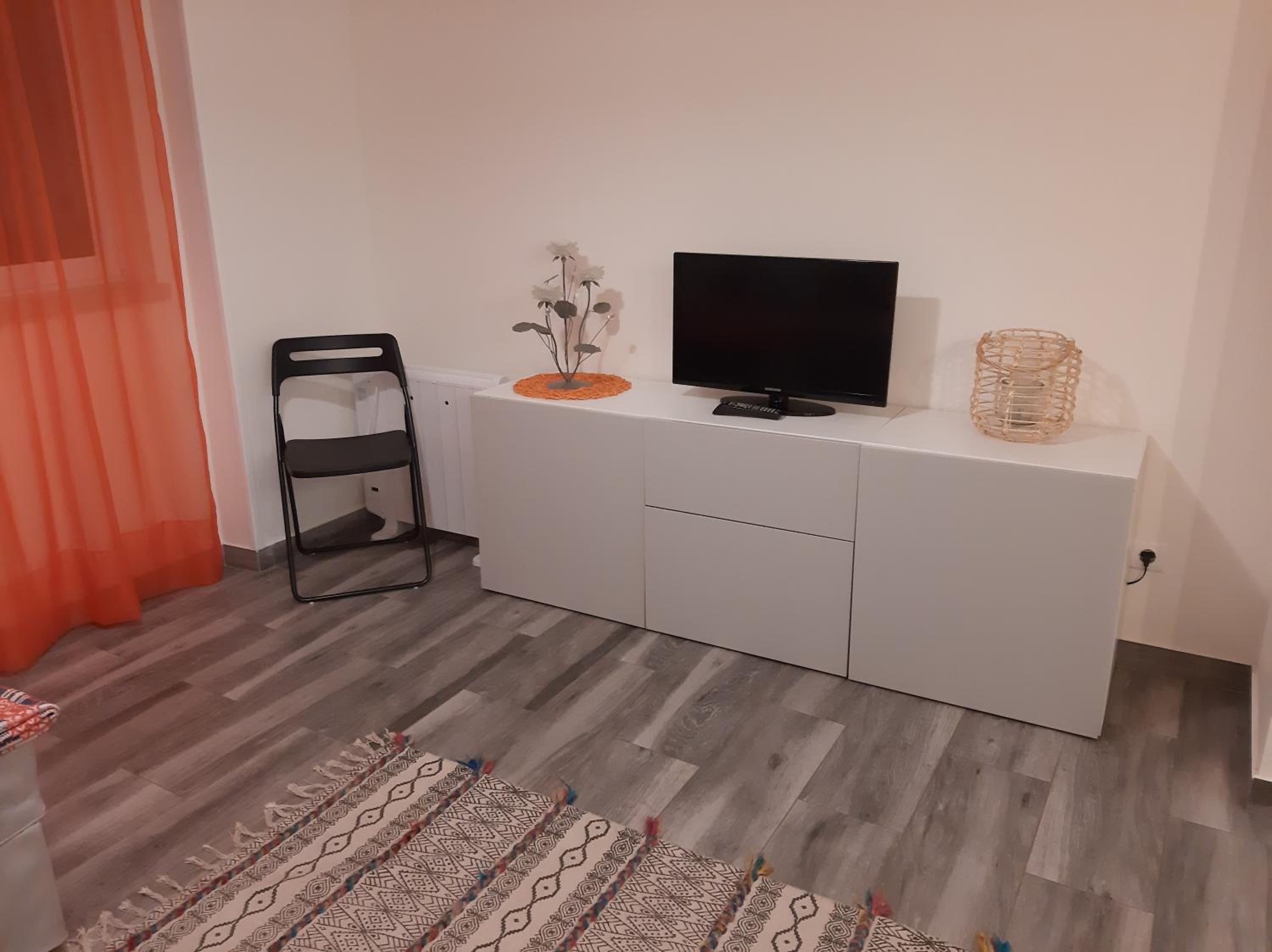 Three-Bedroom House - Photo 26
