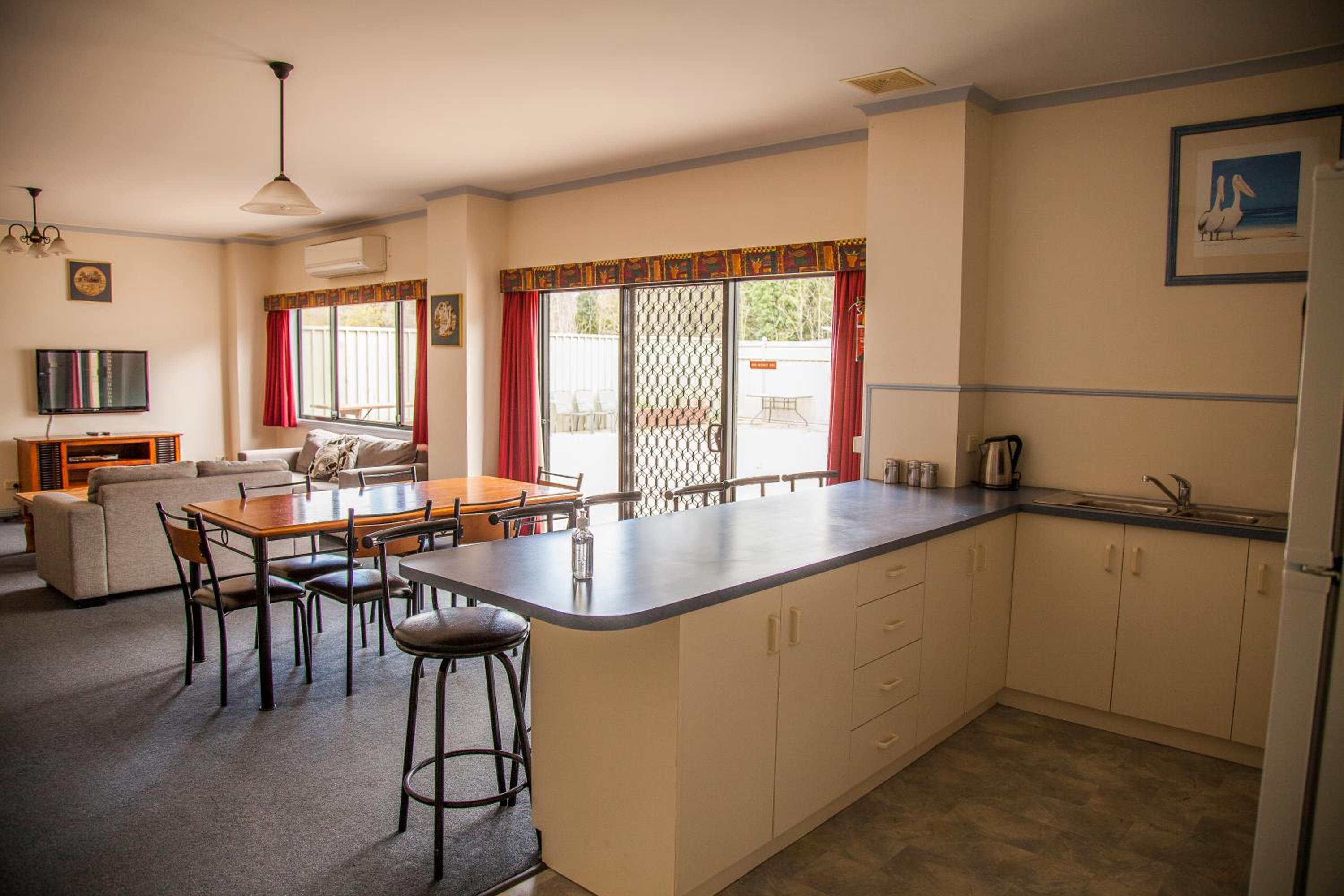 Three-Bedroom Apartment - Photo 16