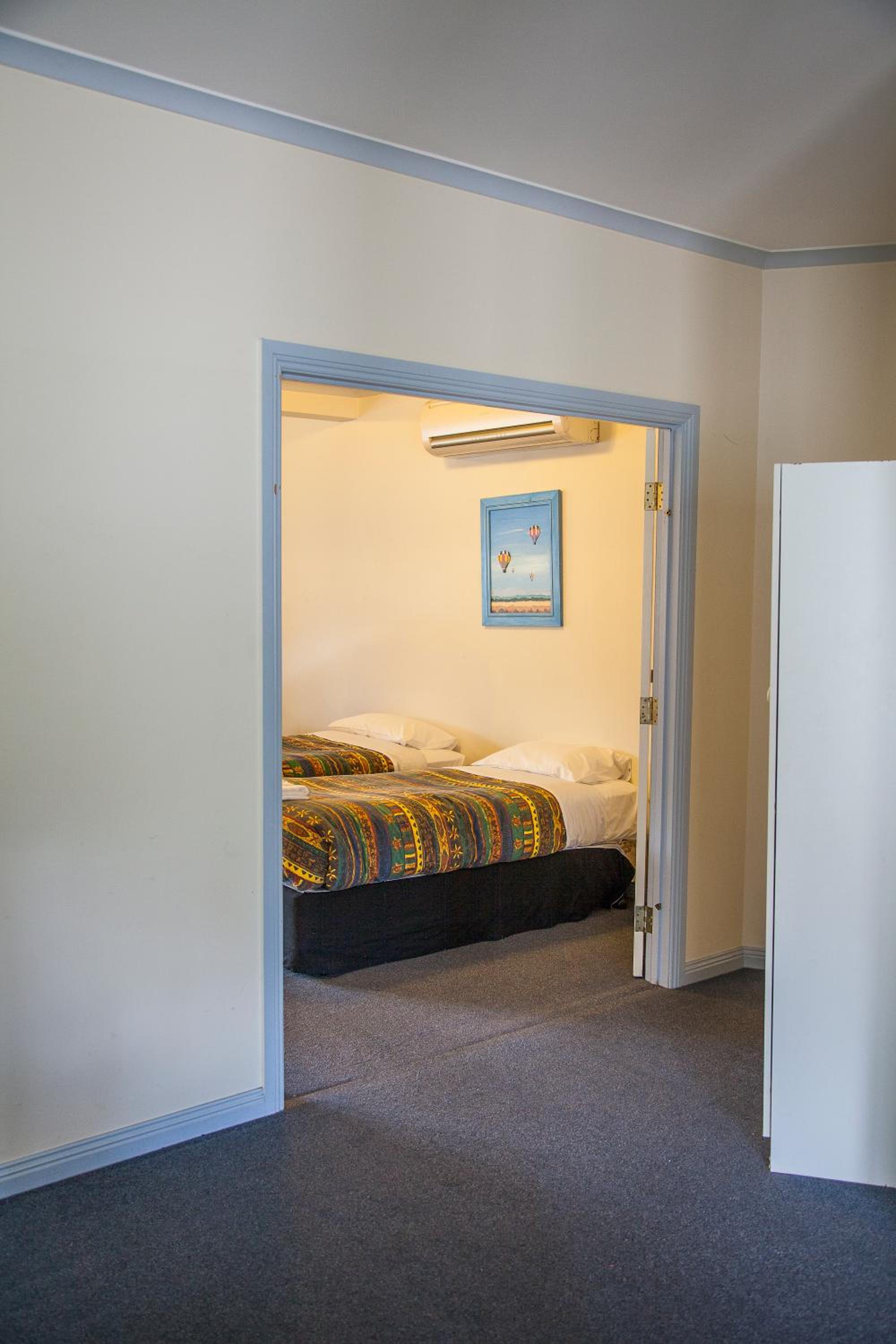 Three-Bedroom Apartment - Photo 29