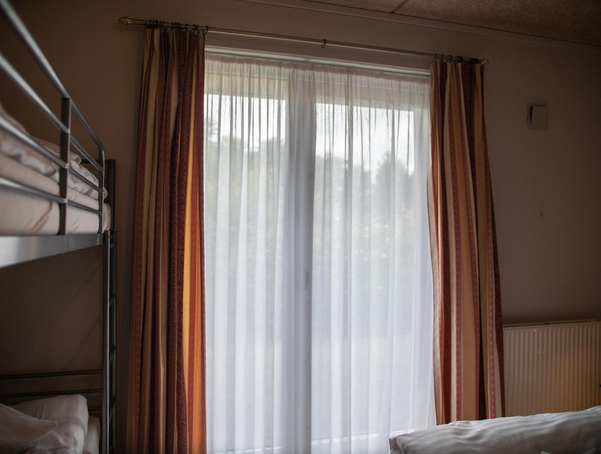 Quadruple Room - Photo 11