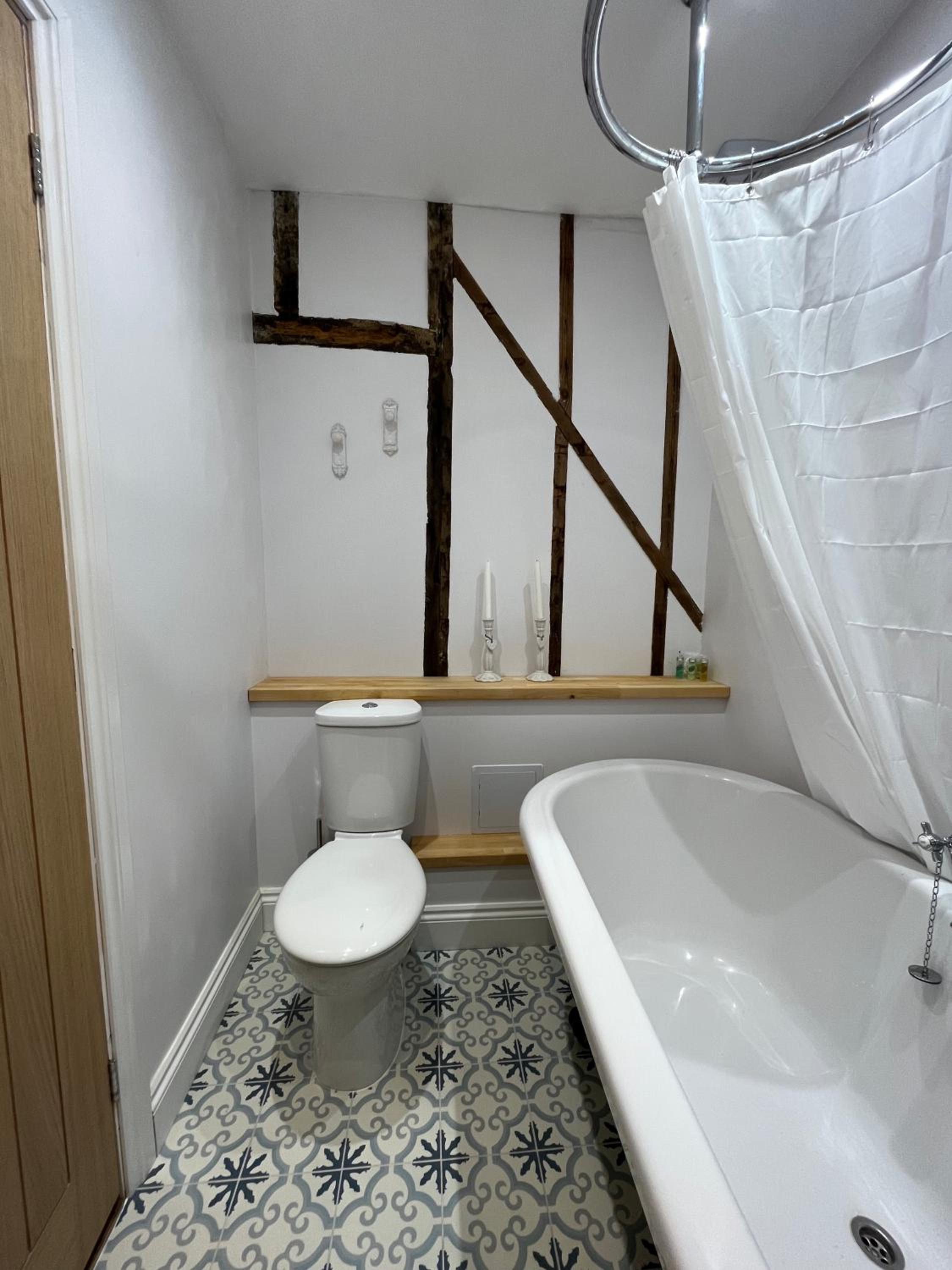 Three-Bedroom House - Photo 13