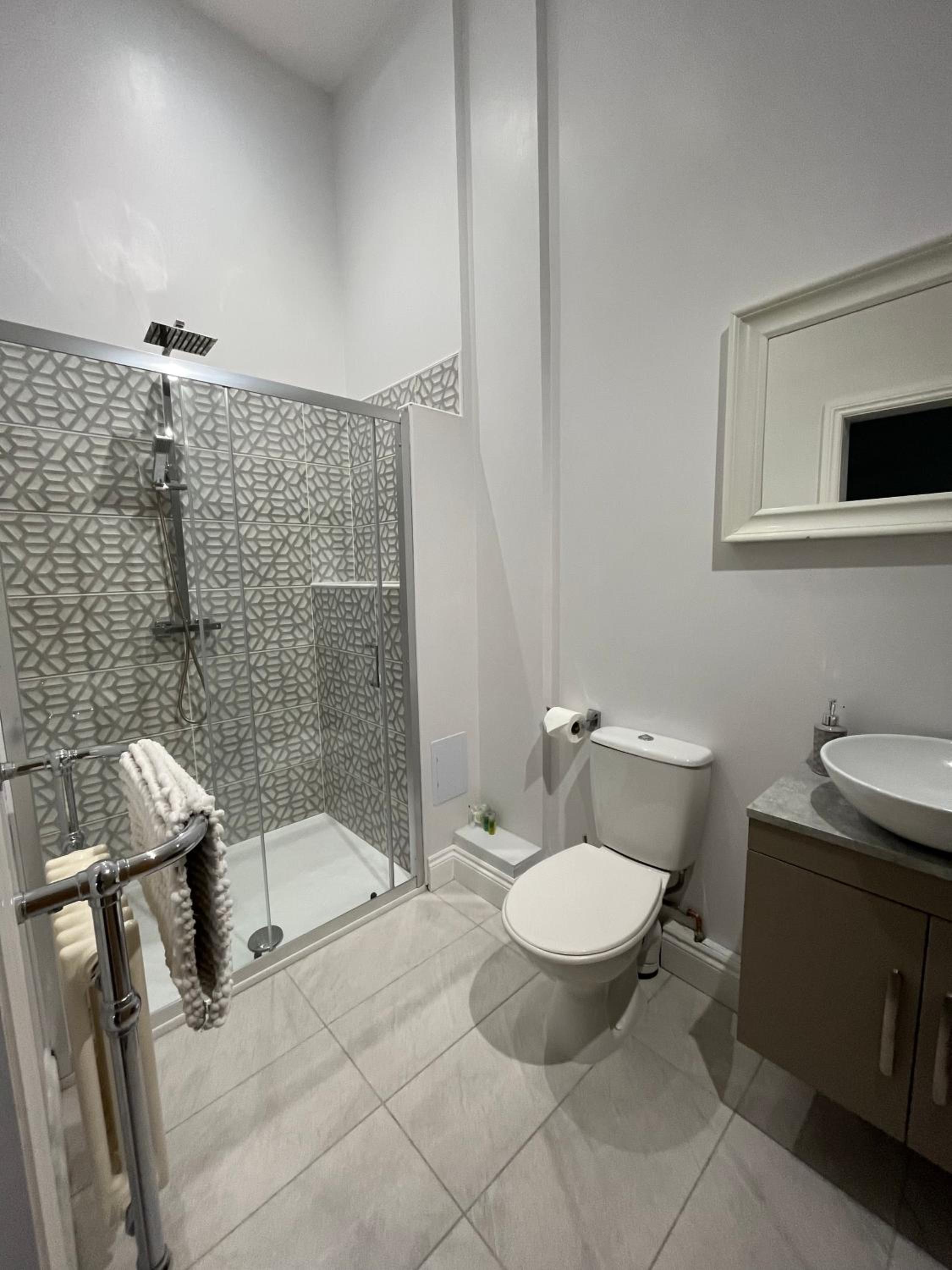 Three-Bedroom House - Photo 17