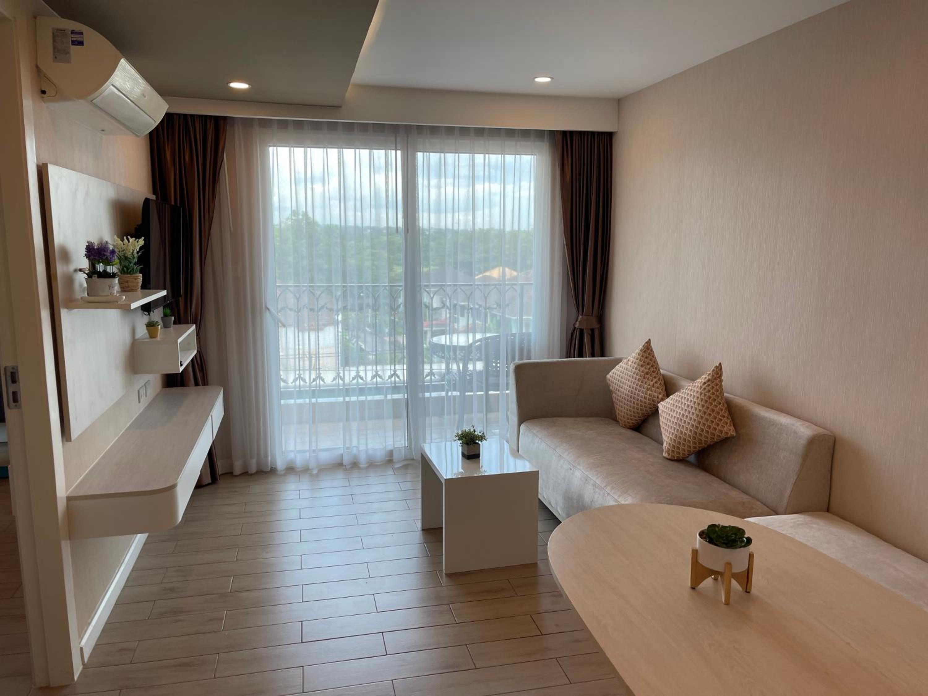 One-Bedroom Apartment with Balcony and City View
