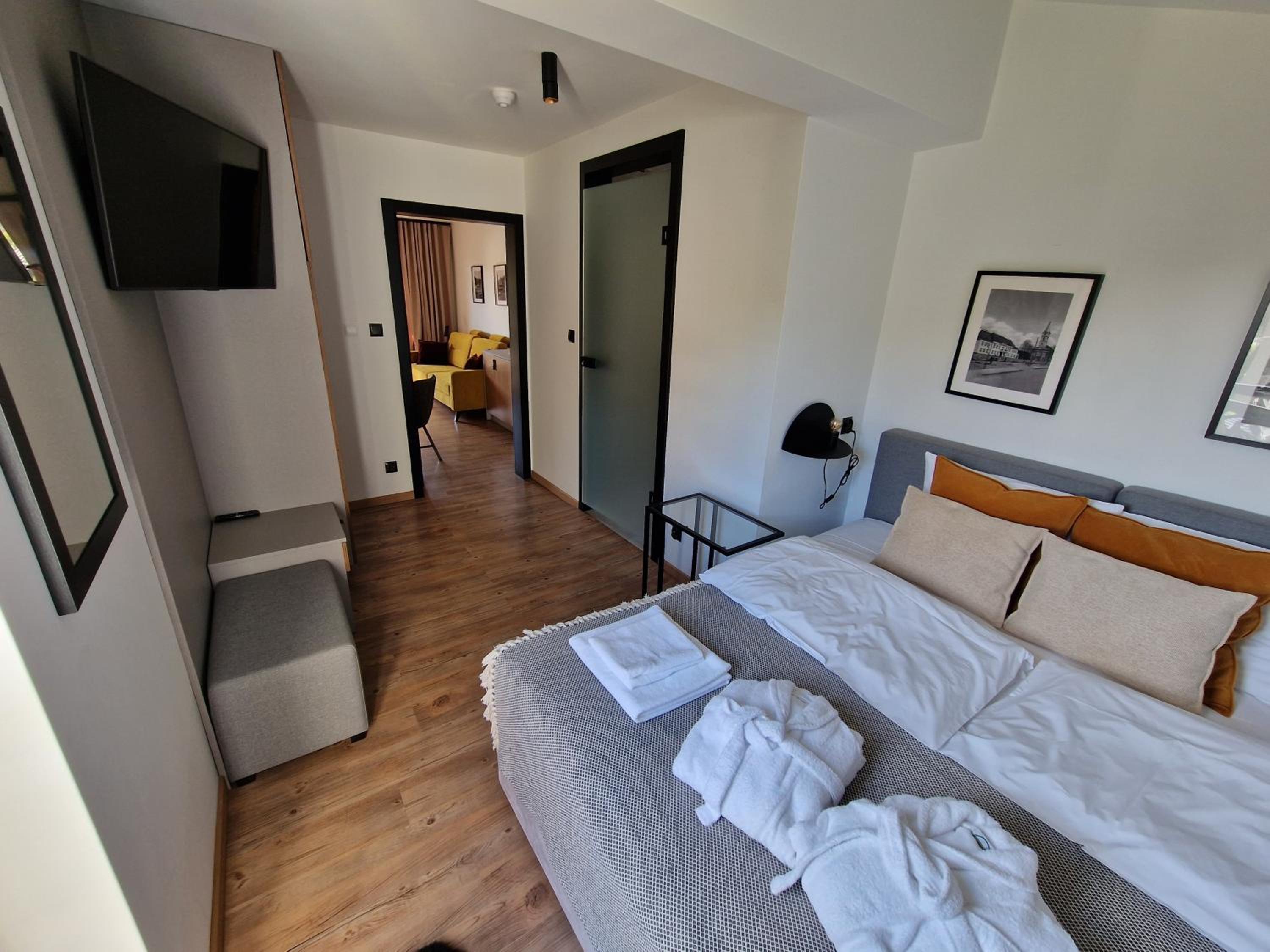 Deluxe Quadruple Room - Photo 7