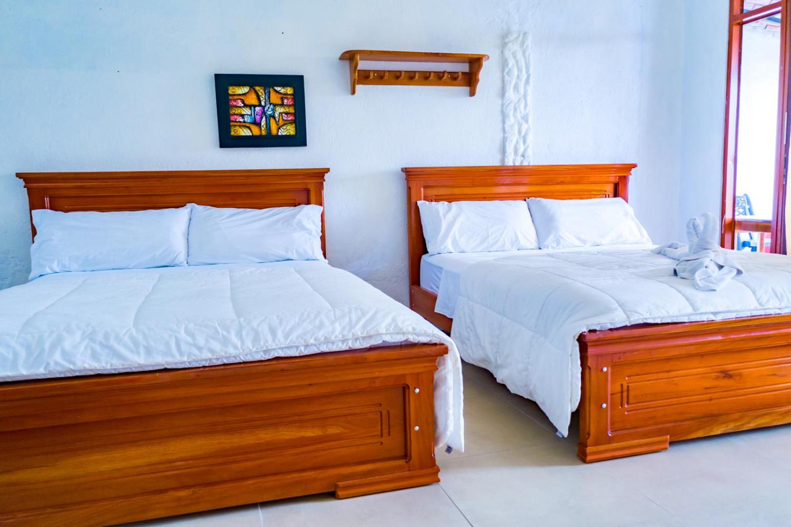 Queen Room with Two  Large Beds with Sea View photo 1