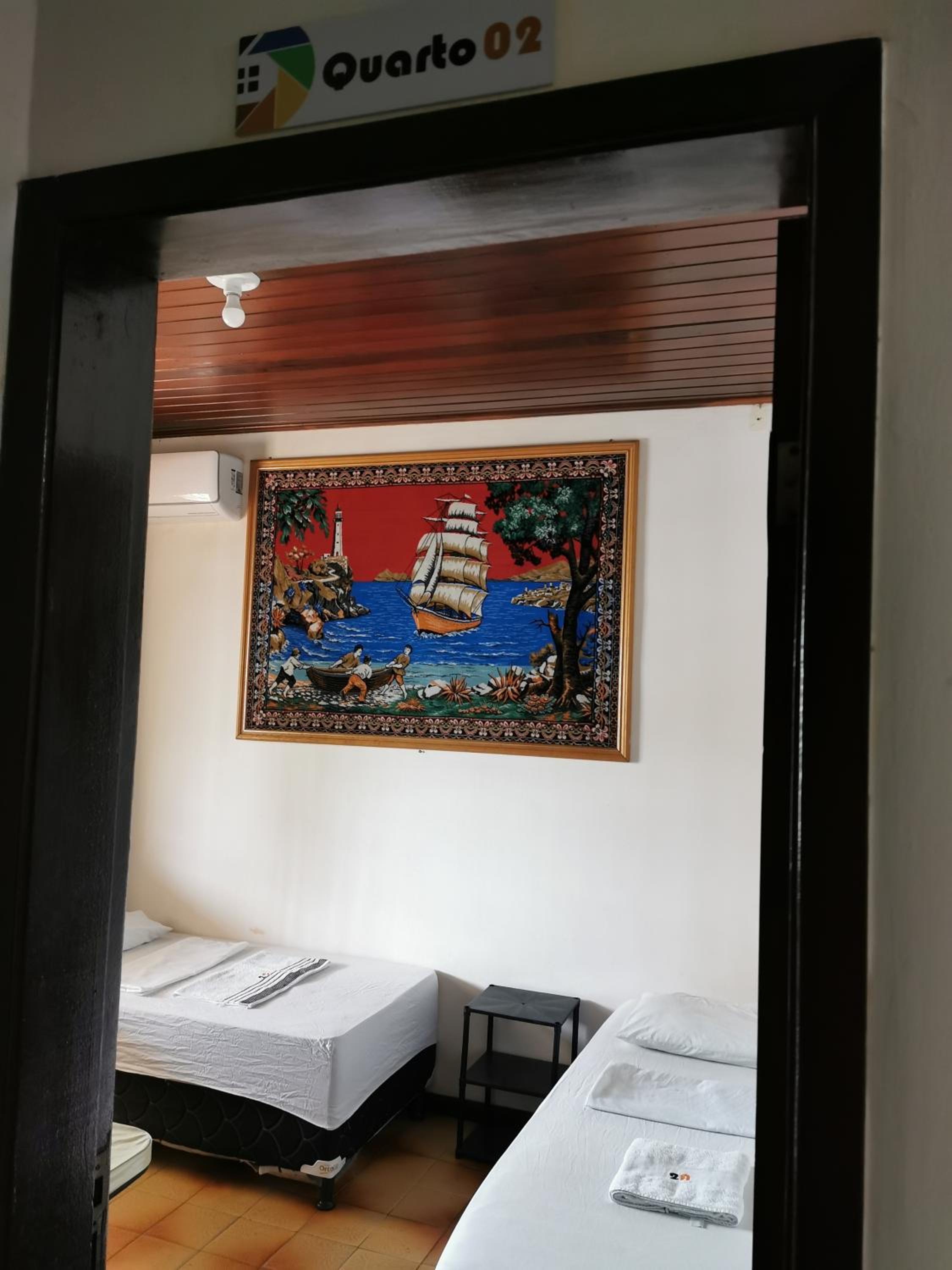 Basic Triple Room with Shared Bathroom photo 1