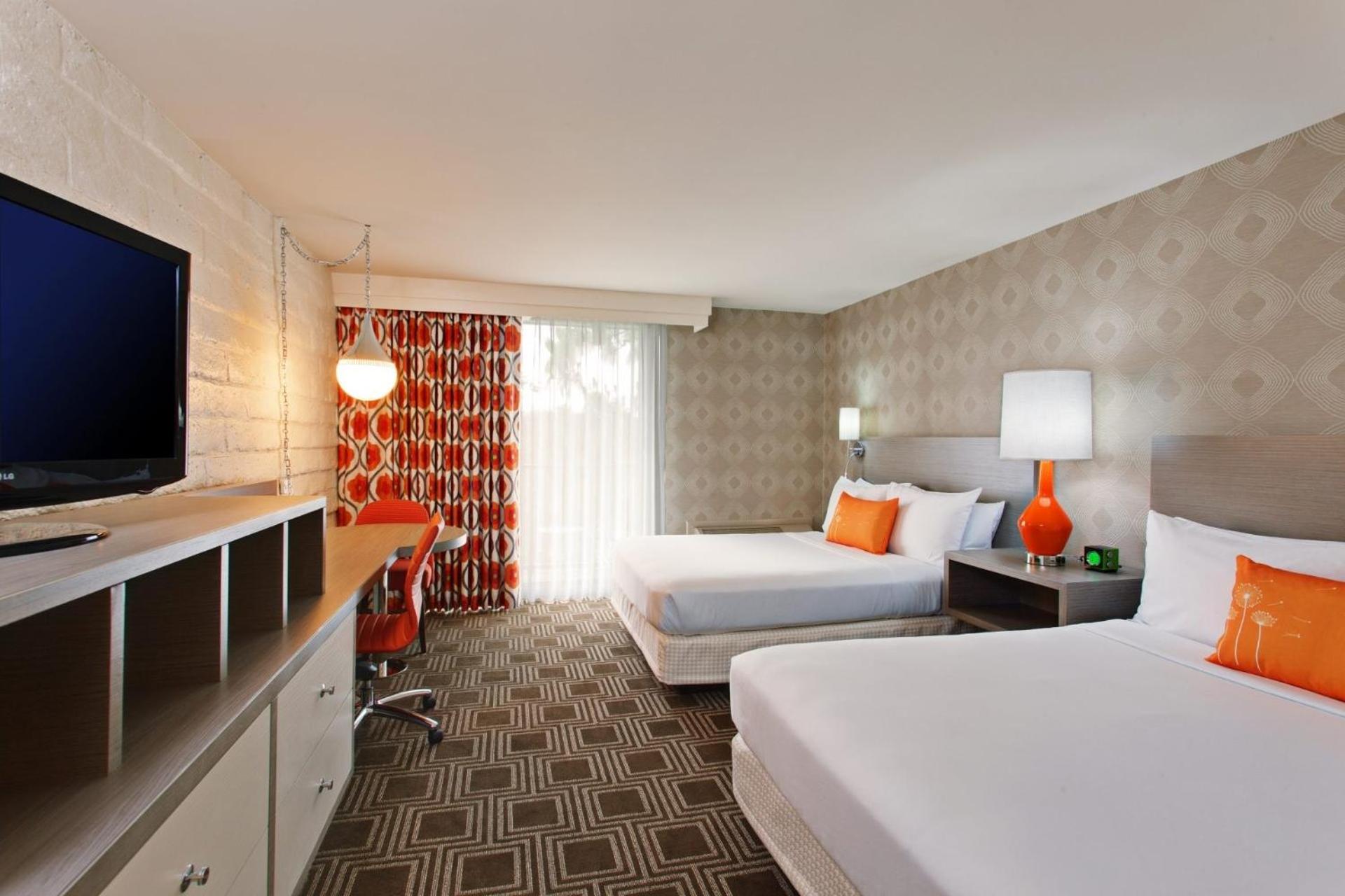 Deluxe Queen Room with Two Queen Beds - Photo 1