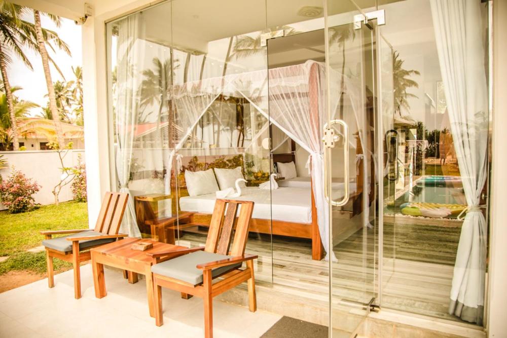 Habitación Triple con Vista al Jardín