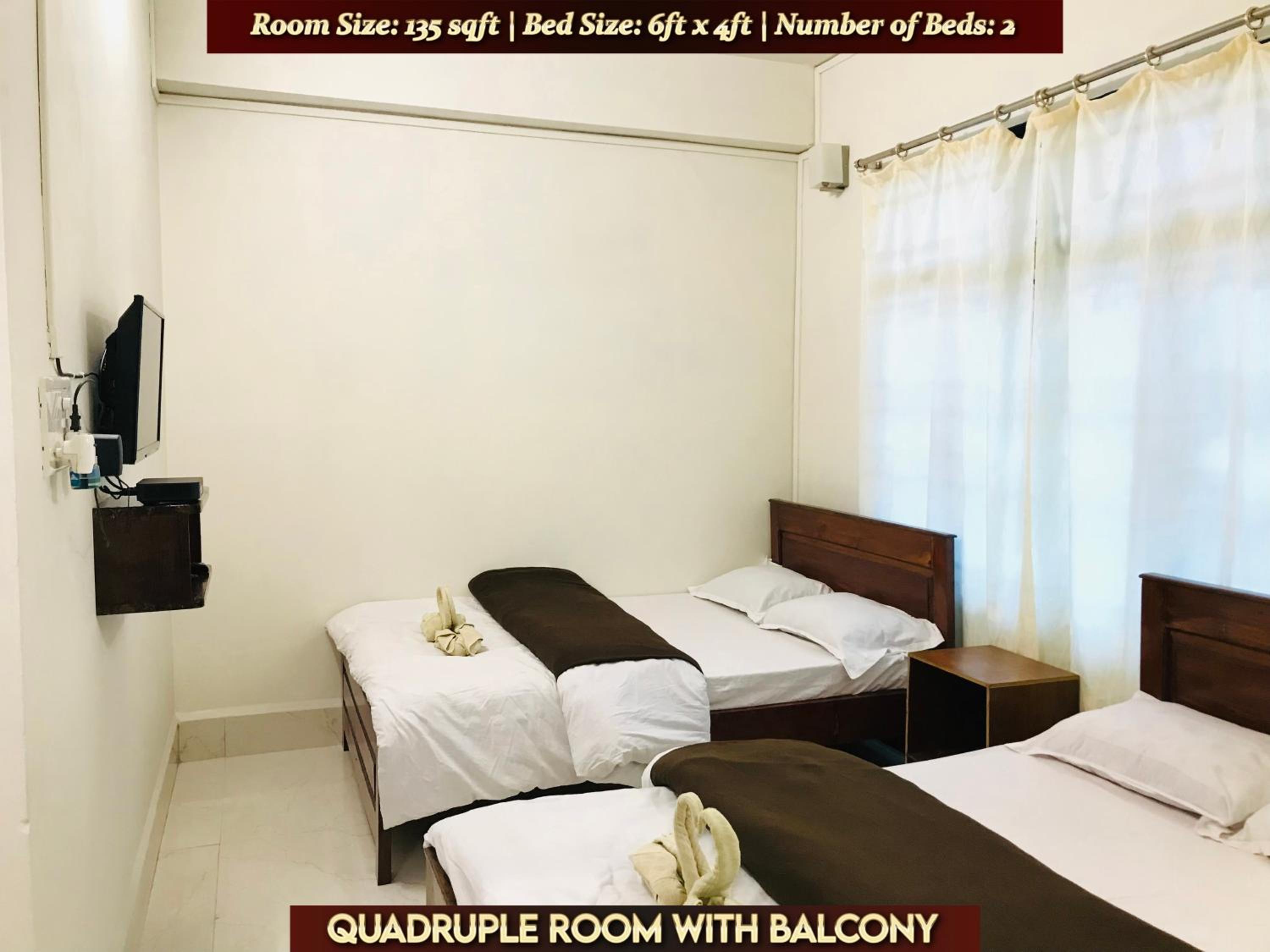 Quadruple Room with Balcony photo 1