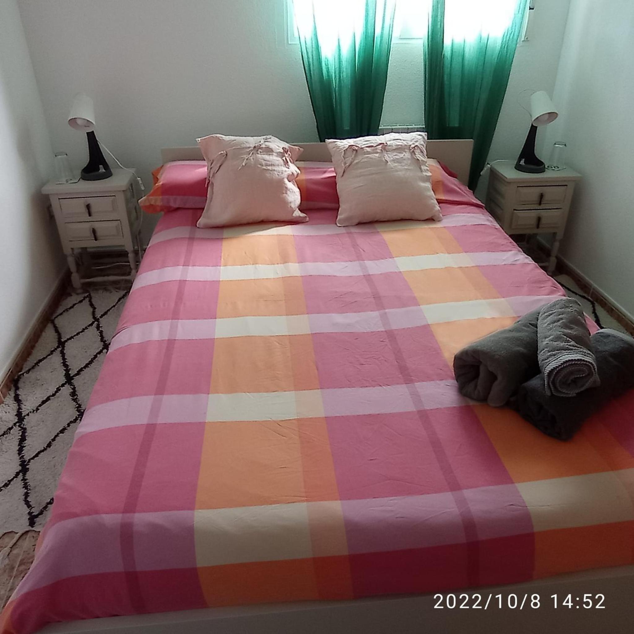 Habitación Queen con Baño Compartido