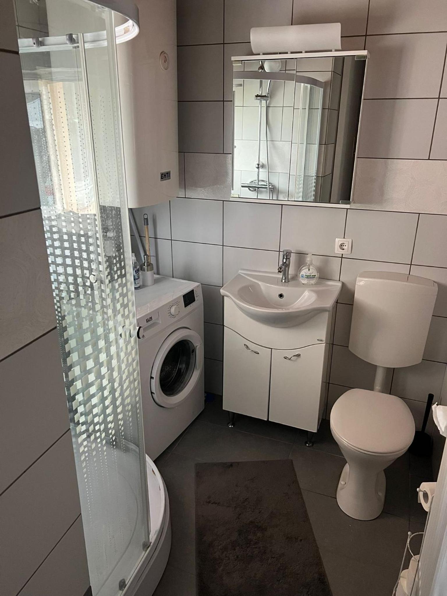 Three-Bedroom Apartment - Photo 2