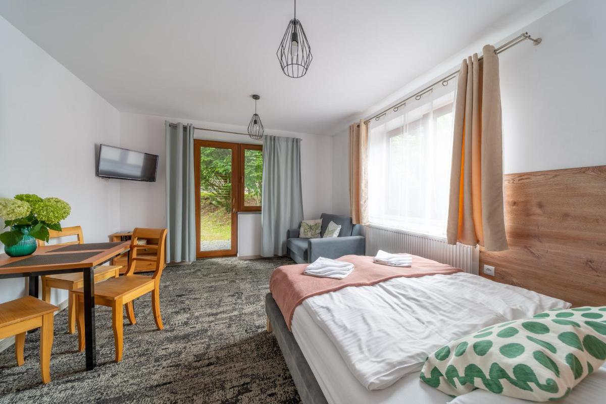 Double Room with Balcony (2 Adults + 1 Child) photo 1