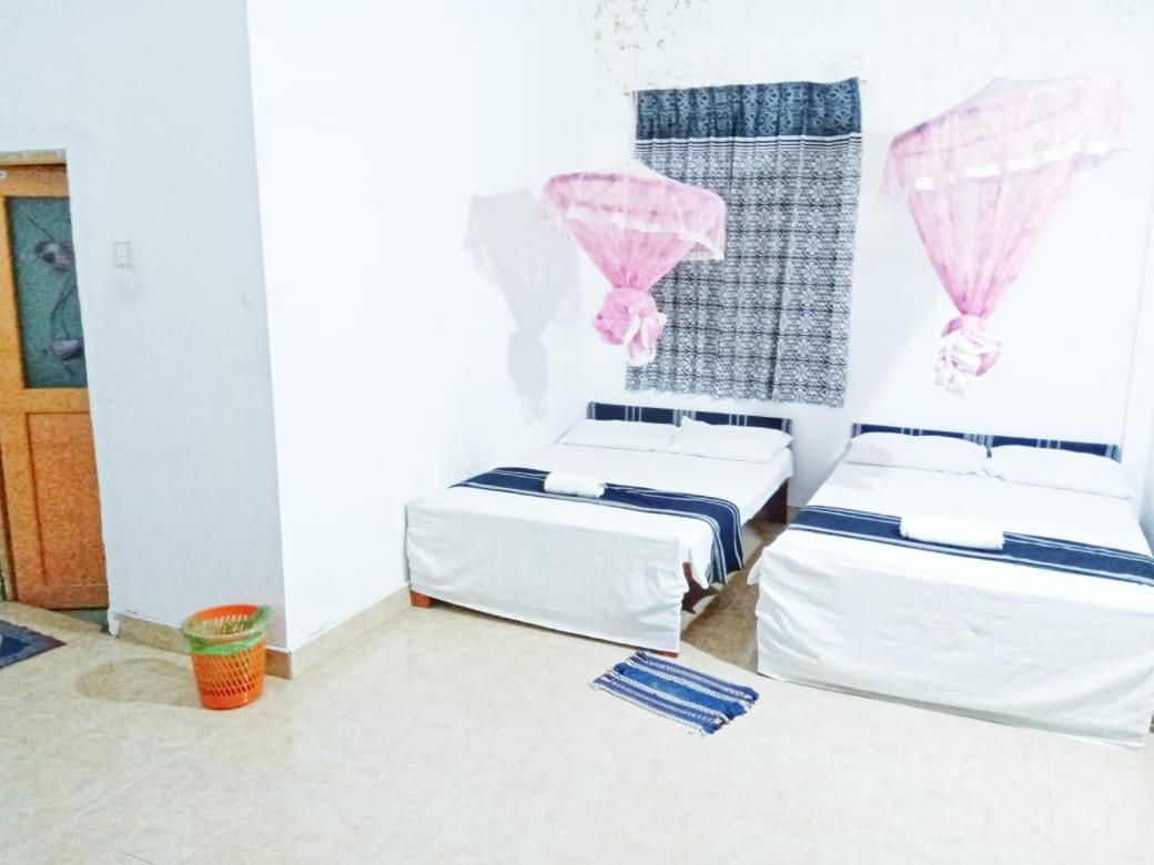 Economy Quadruple Room with Fan photo 2