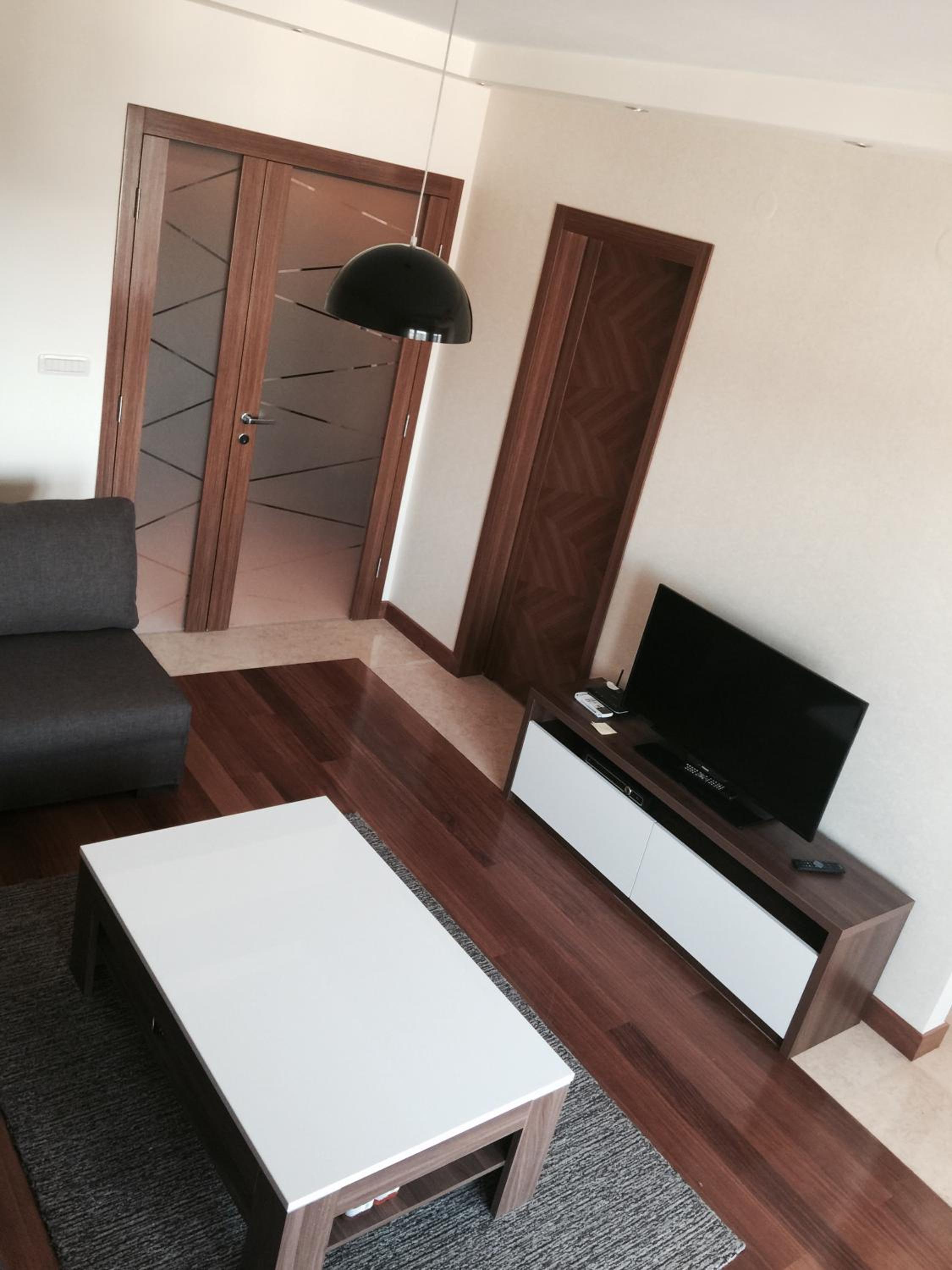 Three-Bedroom Apartment photo 2