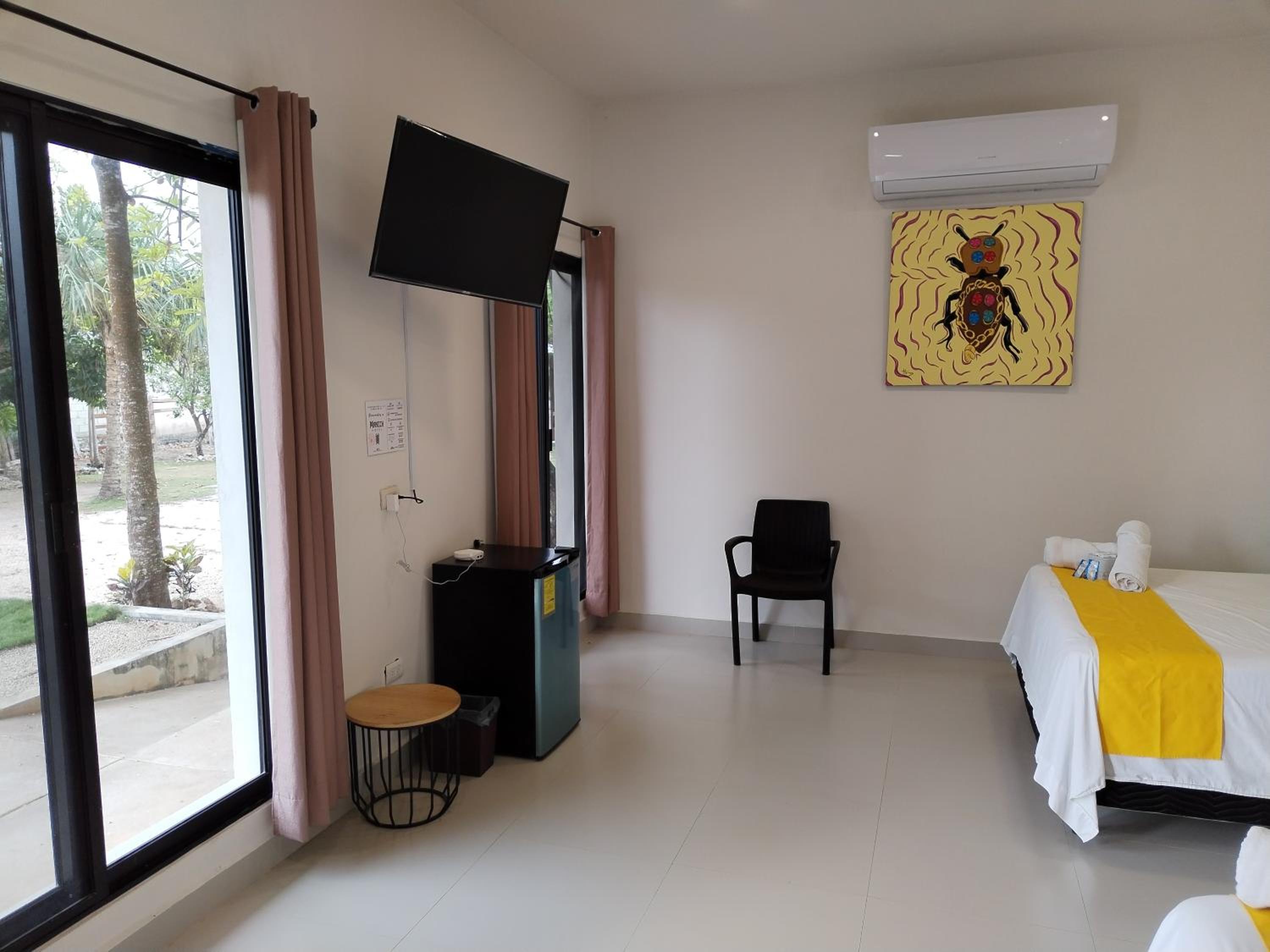 Economy Quadruple Room - Photo 10