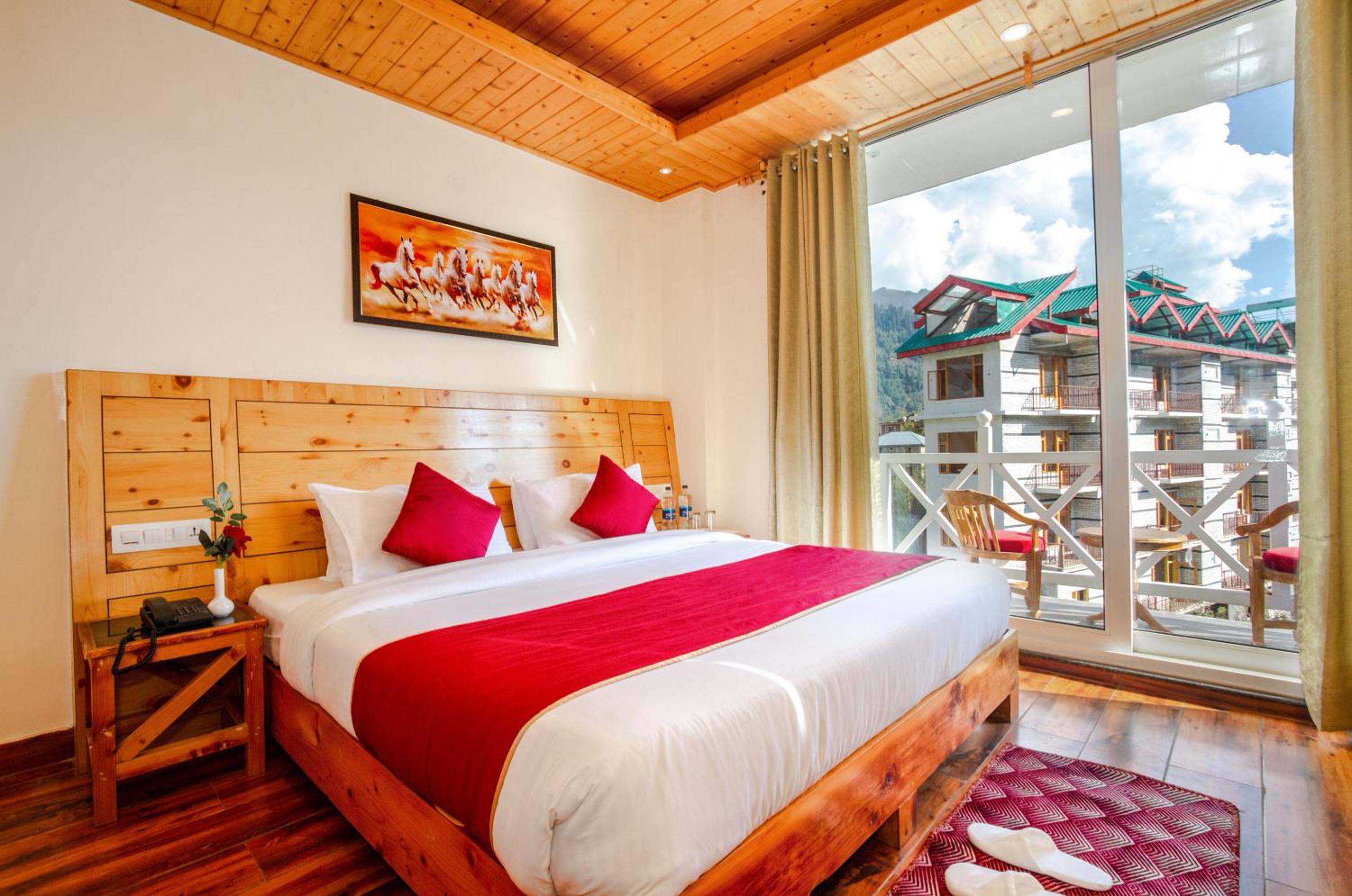 King Suite with Balcony - Photo 8