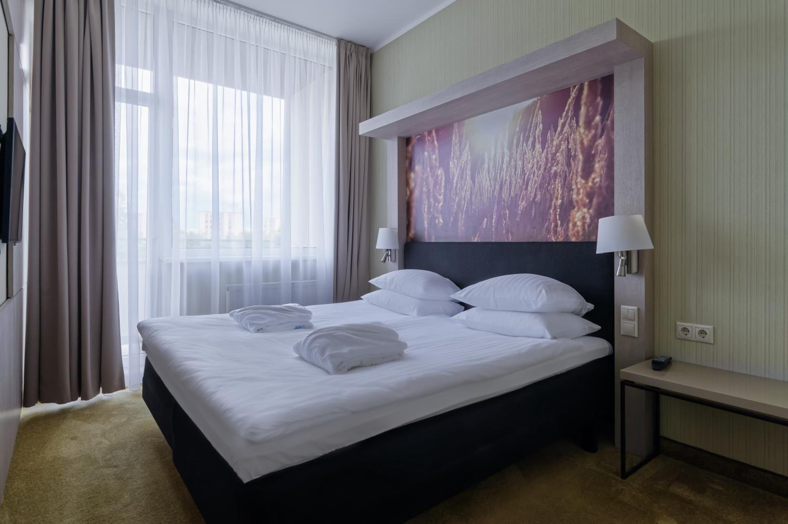 Junior Deluxe Room with Balcony and Spa Access photo 1