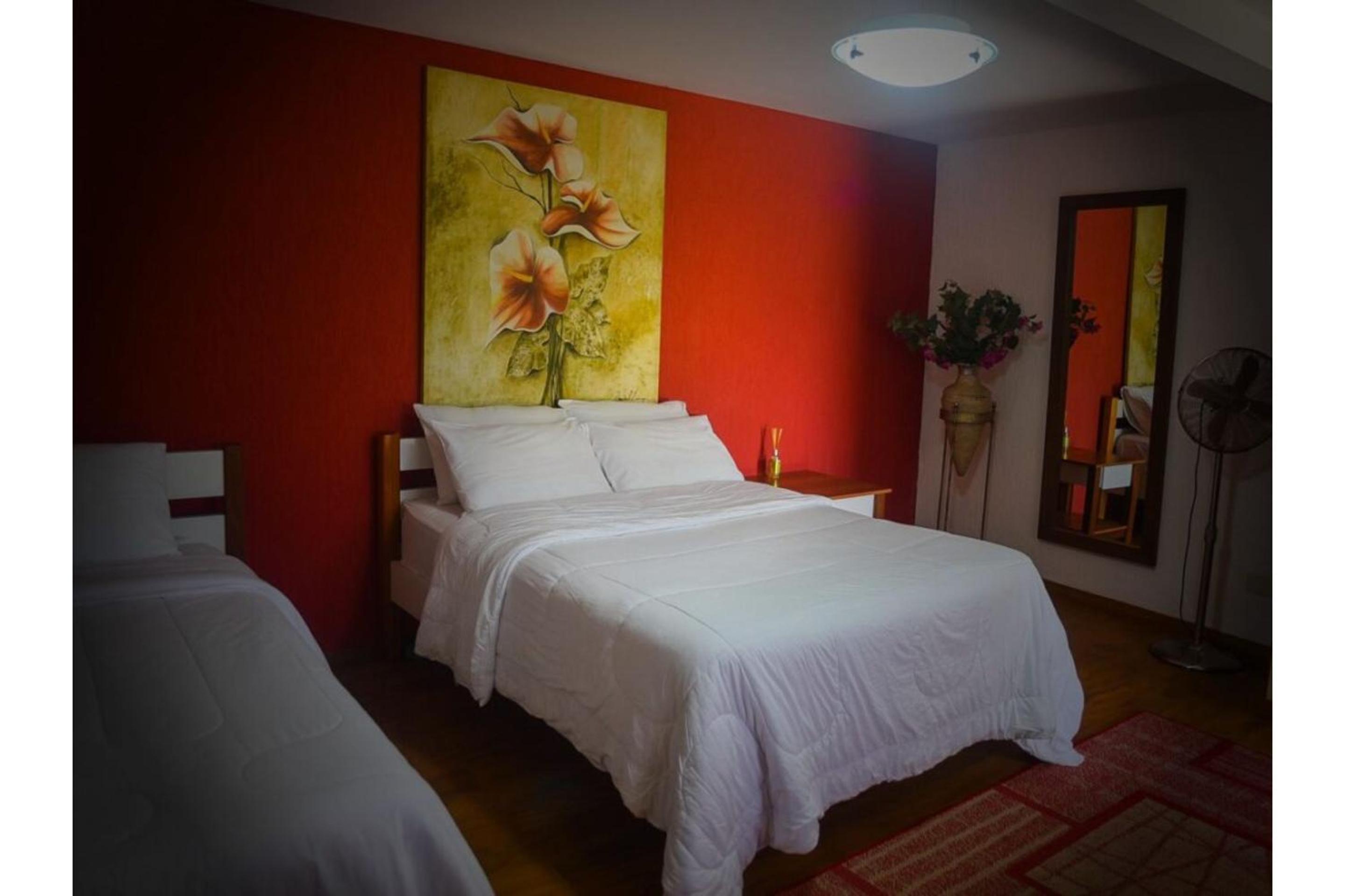Triple Suite (1 Double bed + 1 Single bed)