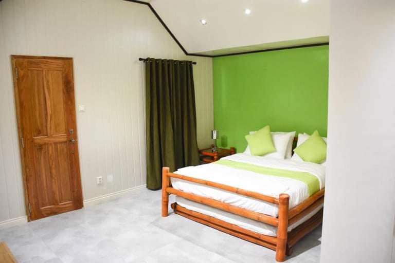 Standard Queen Room with Two Queen Beds - Photo 1