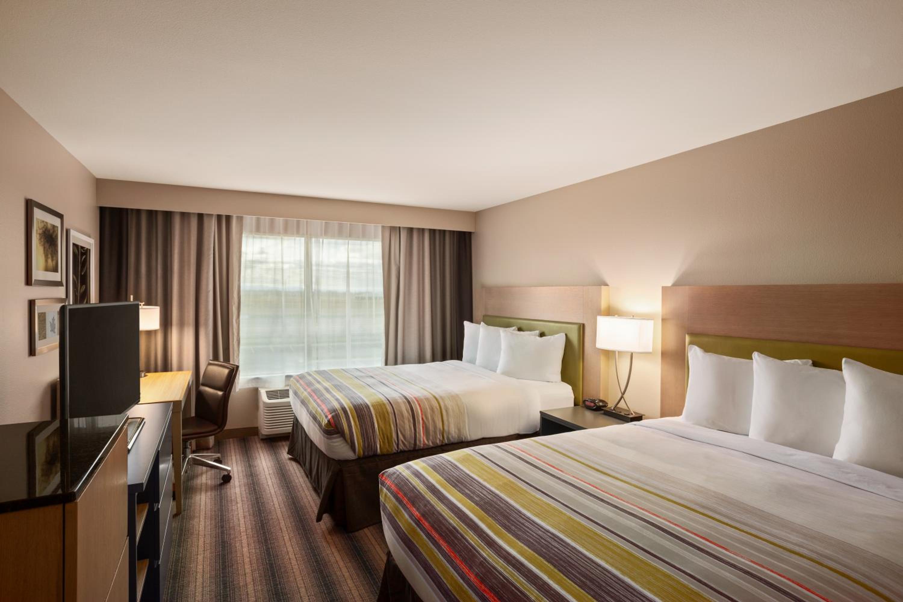 Quadruple Room with Two Queen Beds - Disability Access/Non Smoking photo 1