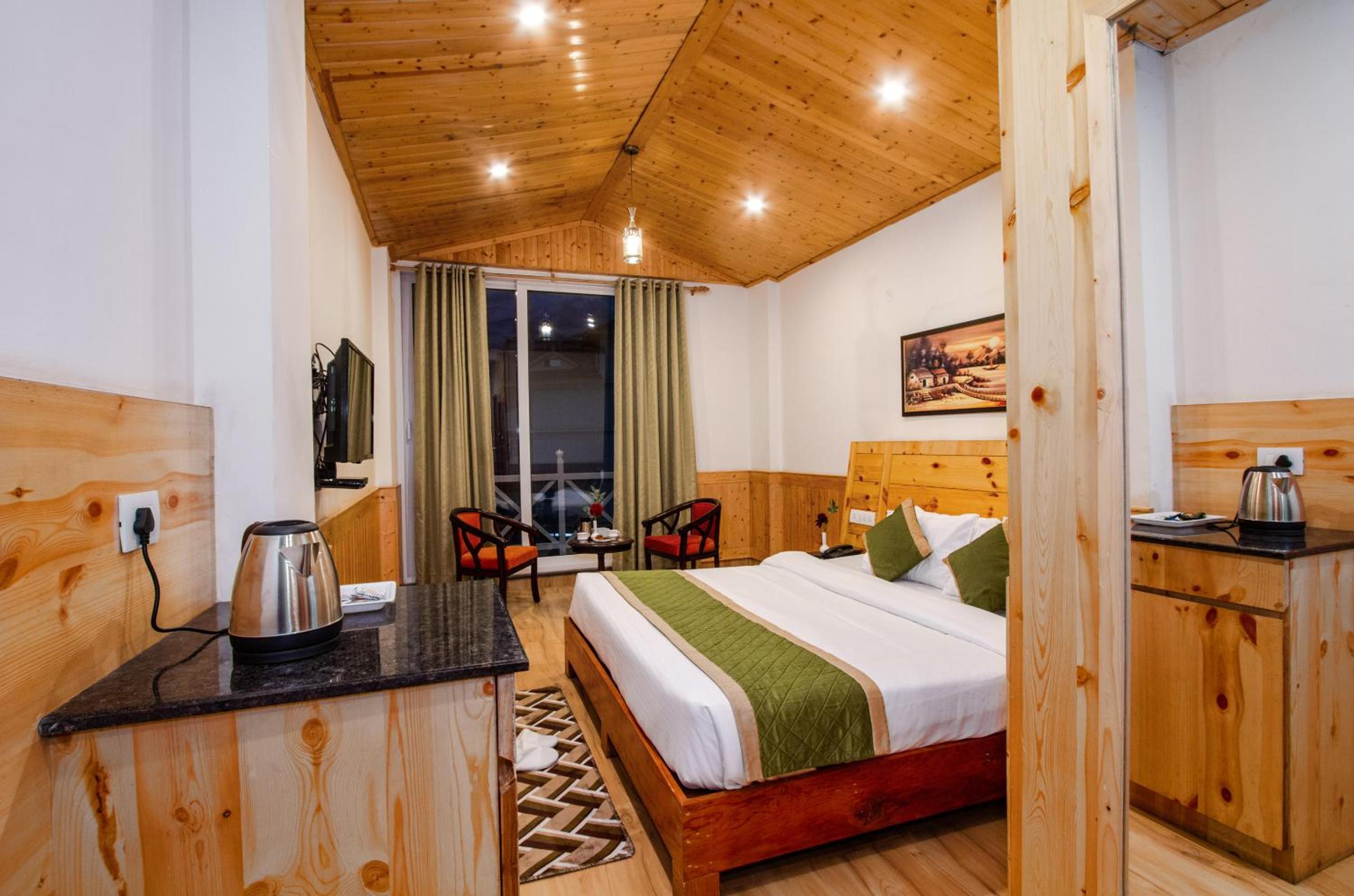 King Suite with Balcony - Photo 12