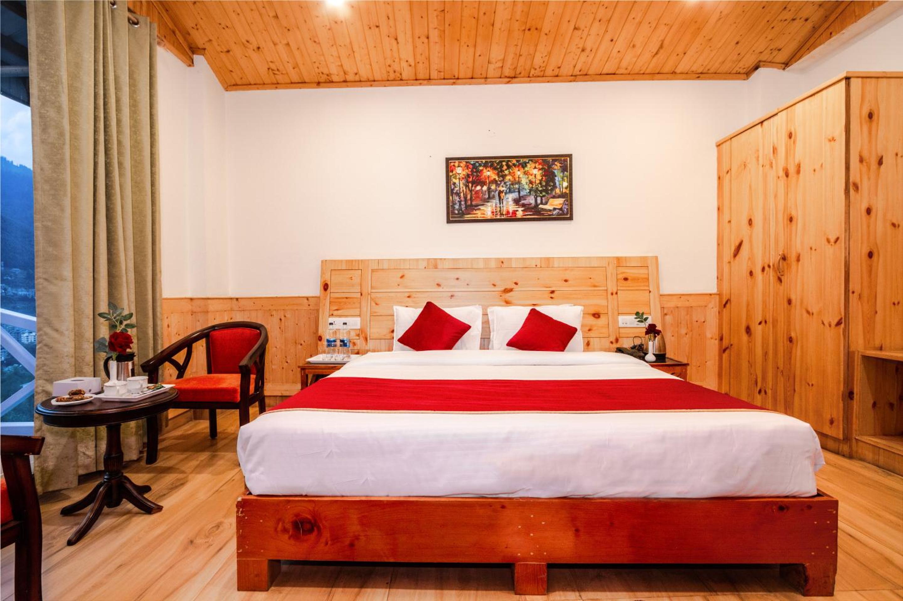 King Suite with Balcony - Photo 13