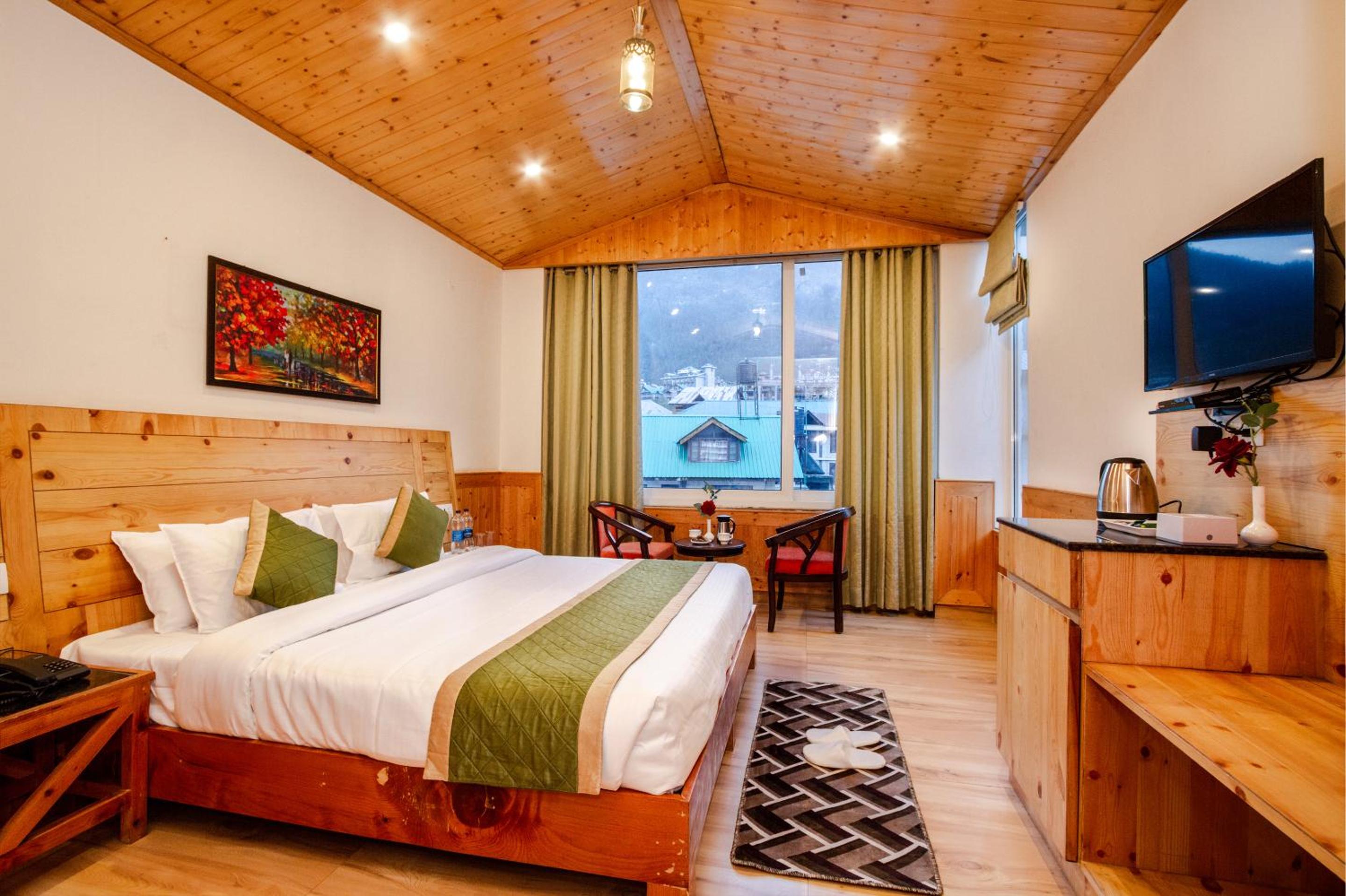 King Suite with Balcony - Photo 1