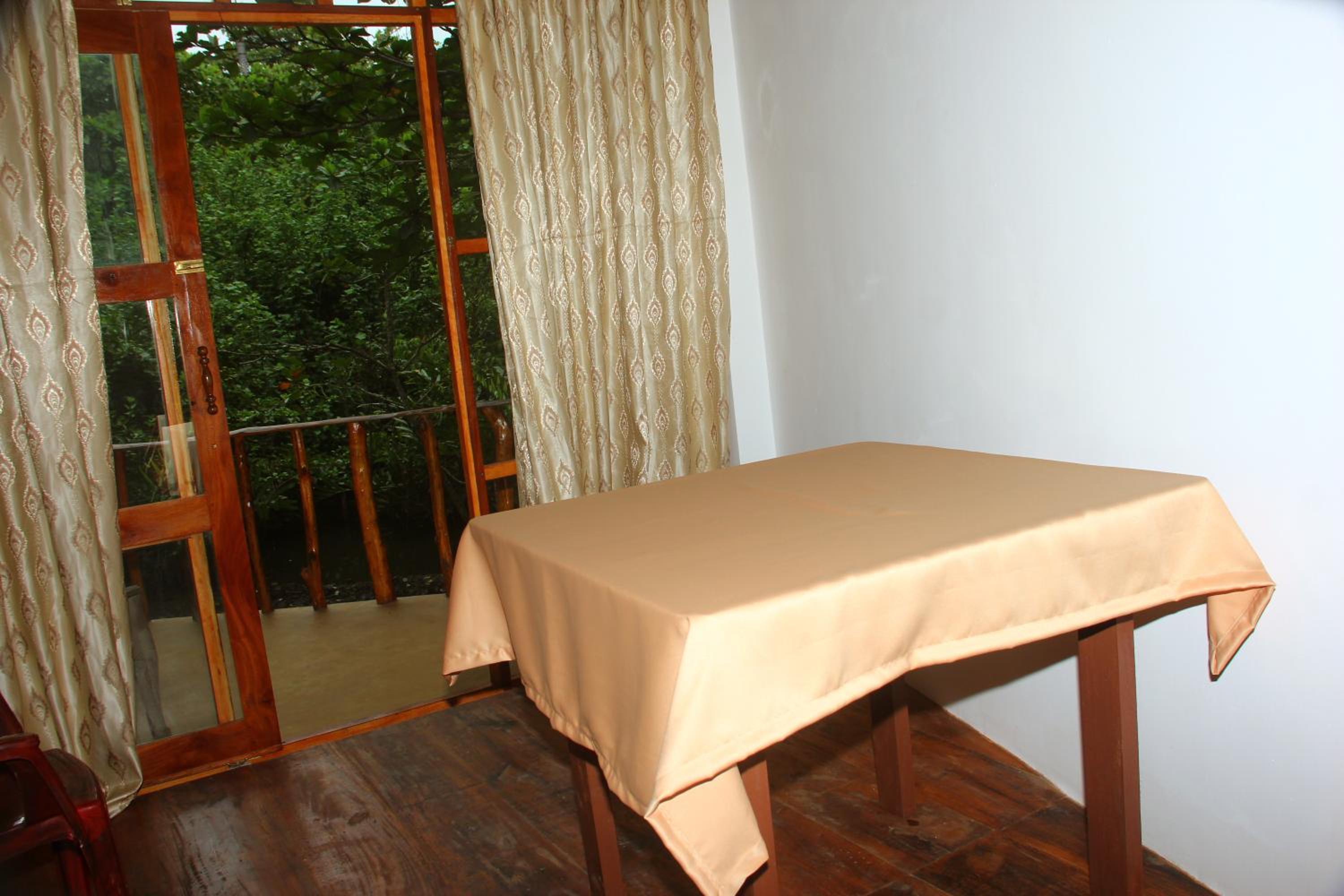 Standard Double Room with Fan & Balcony Upper Floor photo 3