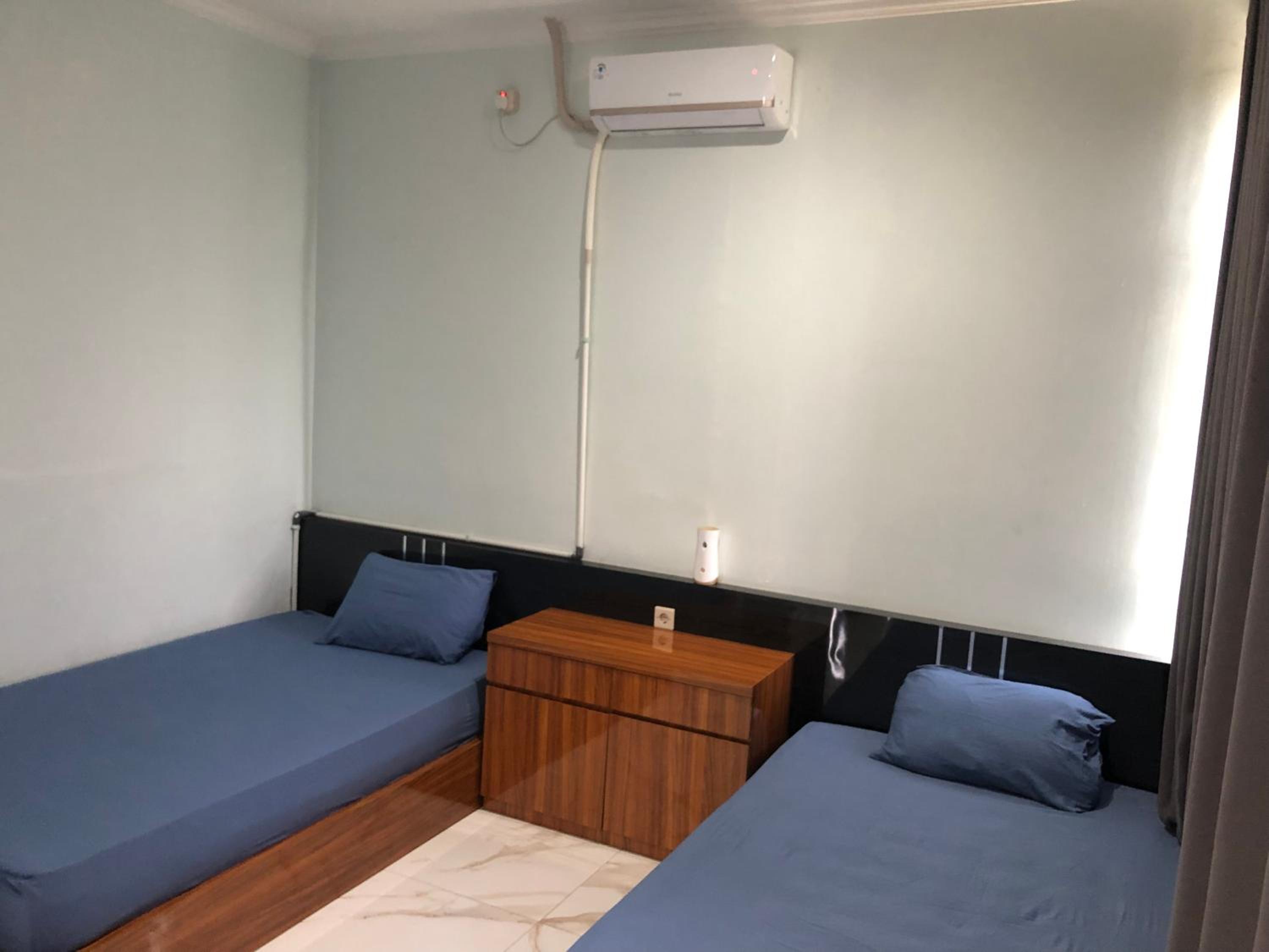 Twin Room - Photo 1