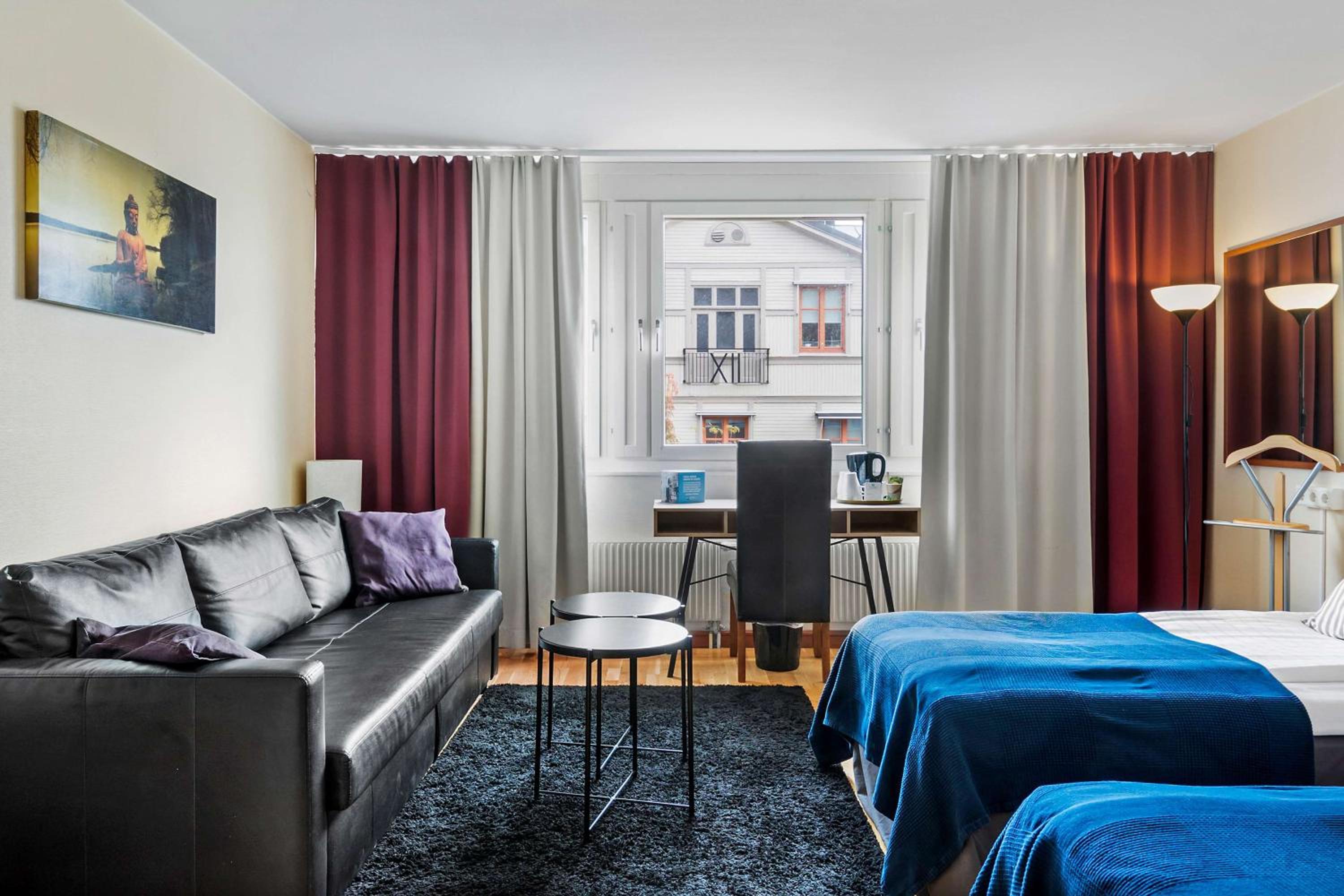 Family Room with Two Single Beds and Sofa Bed - Non-Smoking photo 1