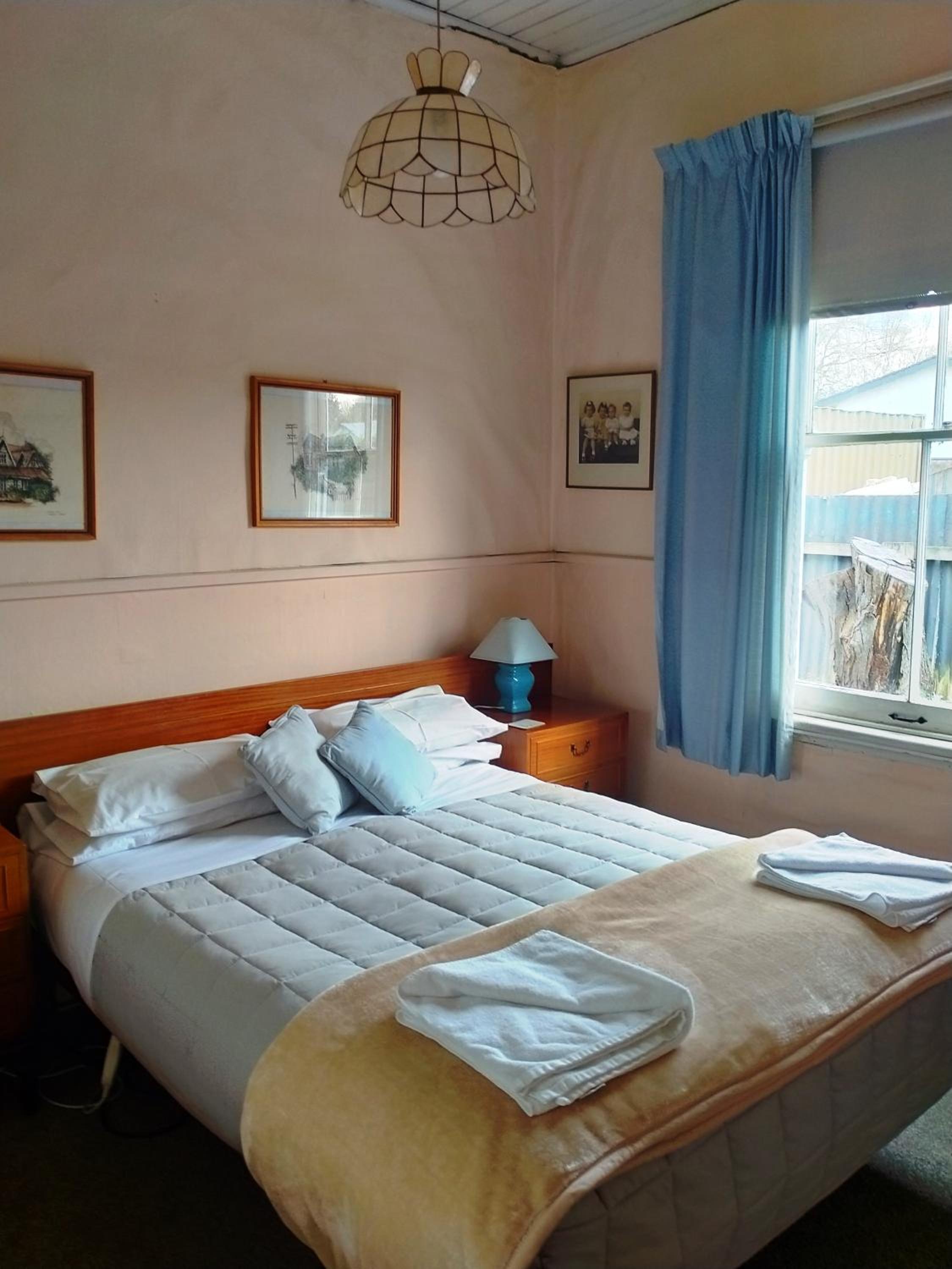 Three-Bedroom House - Photo 23