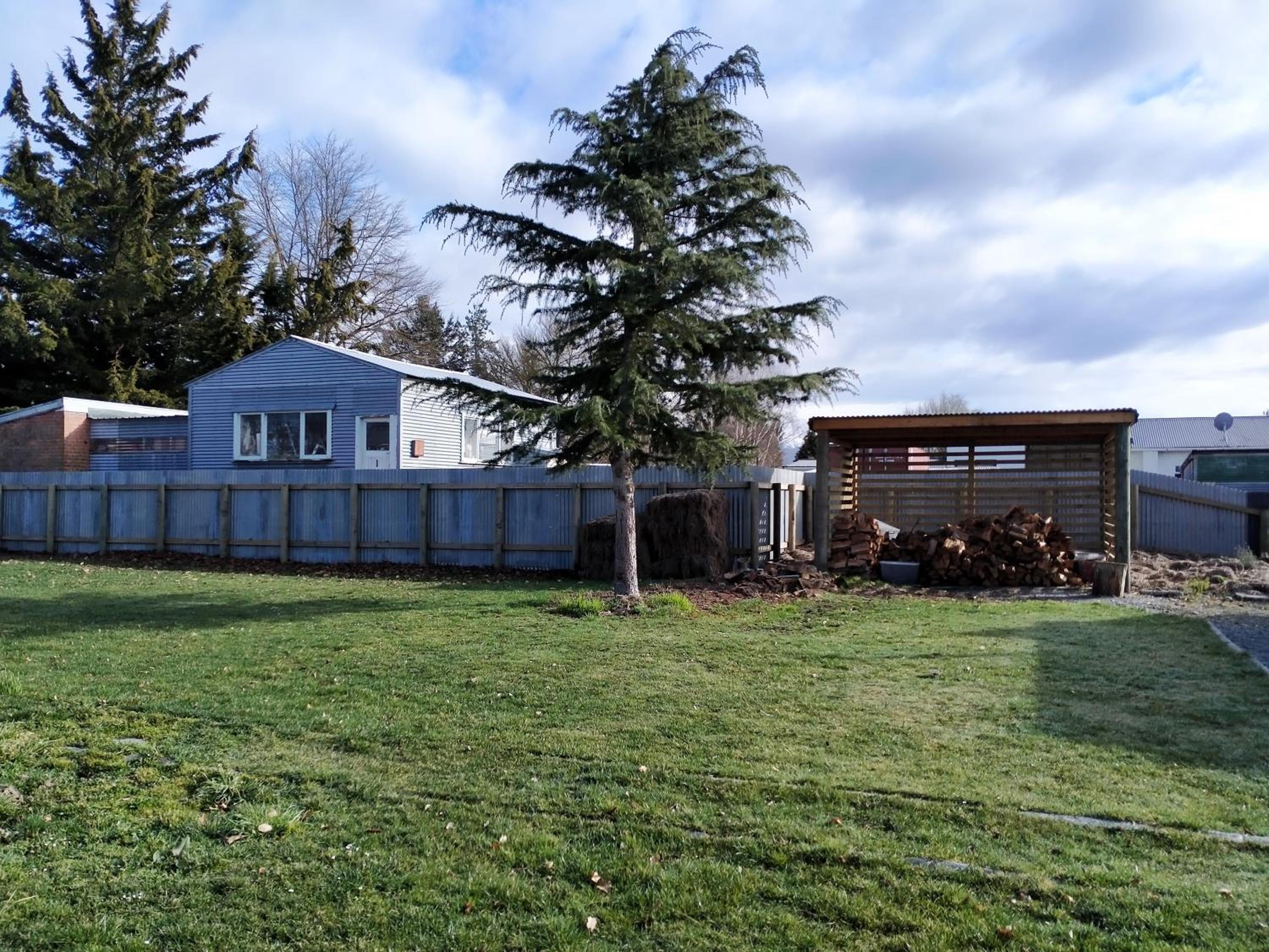Three-Bedroom House - Photo 31