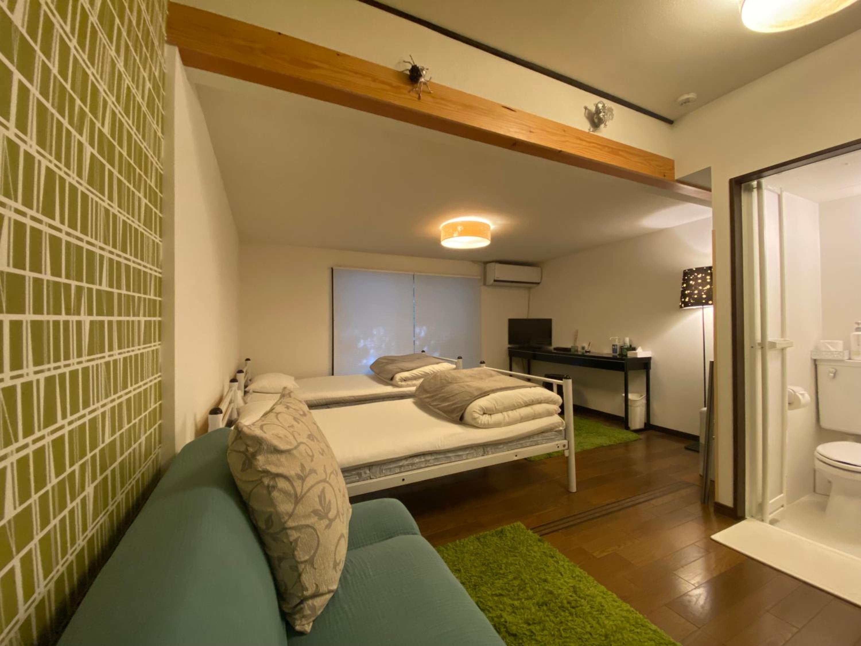 Twin Room with Private Bathroom - Photo 2
