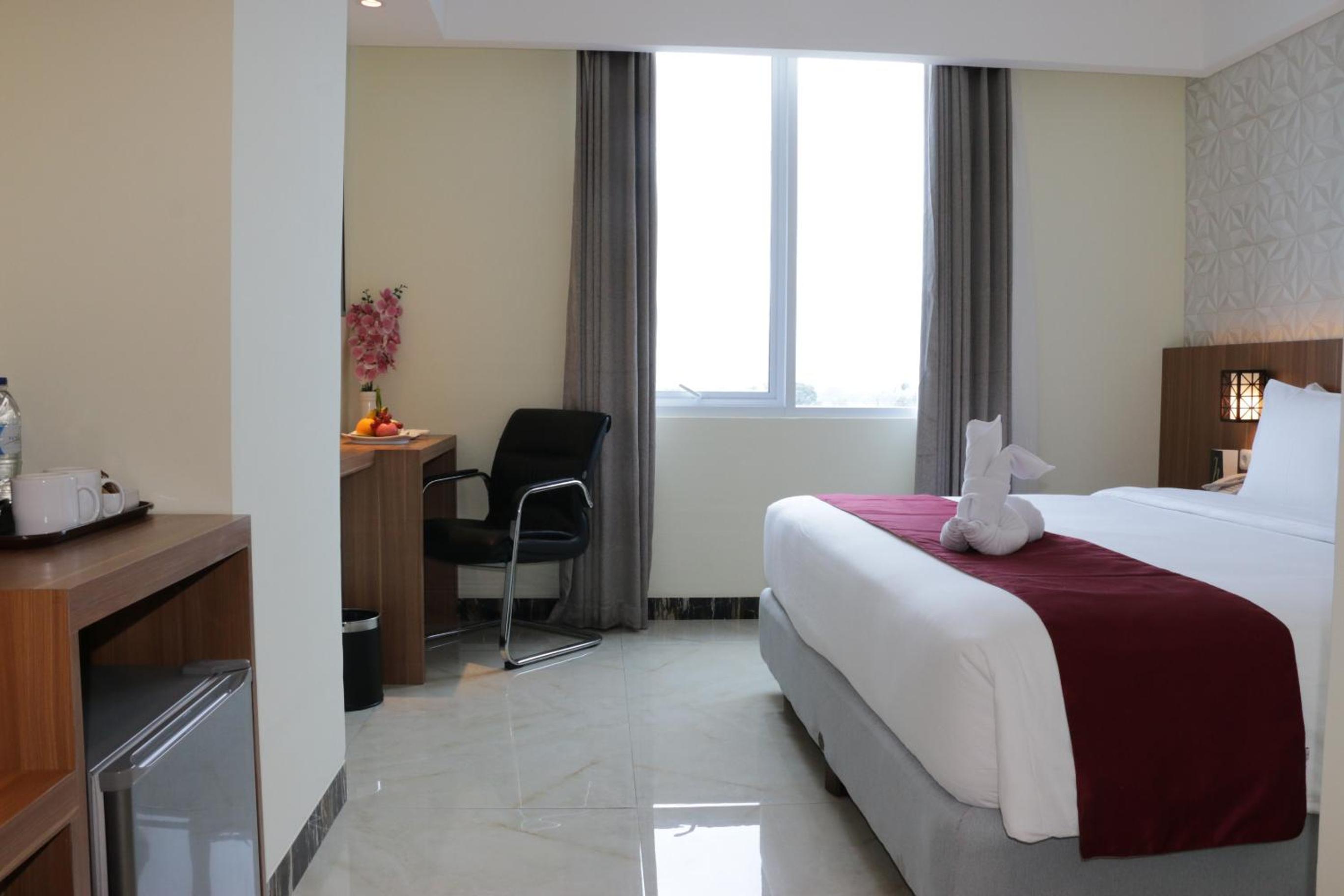 Deluxe Room - Photo 19