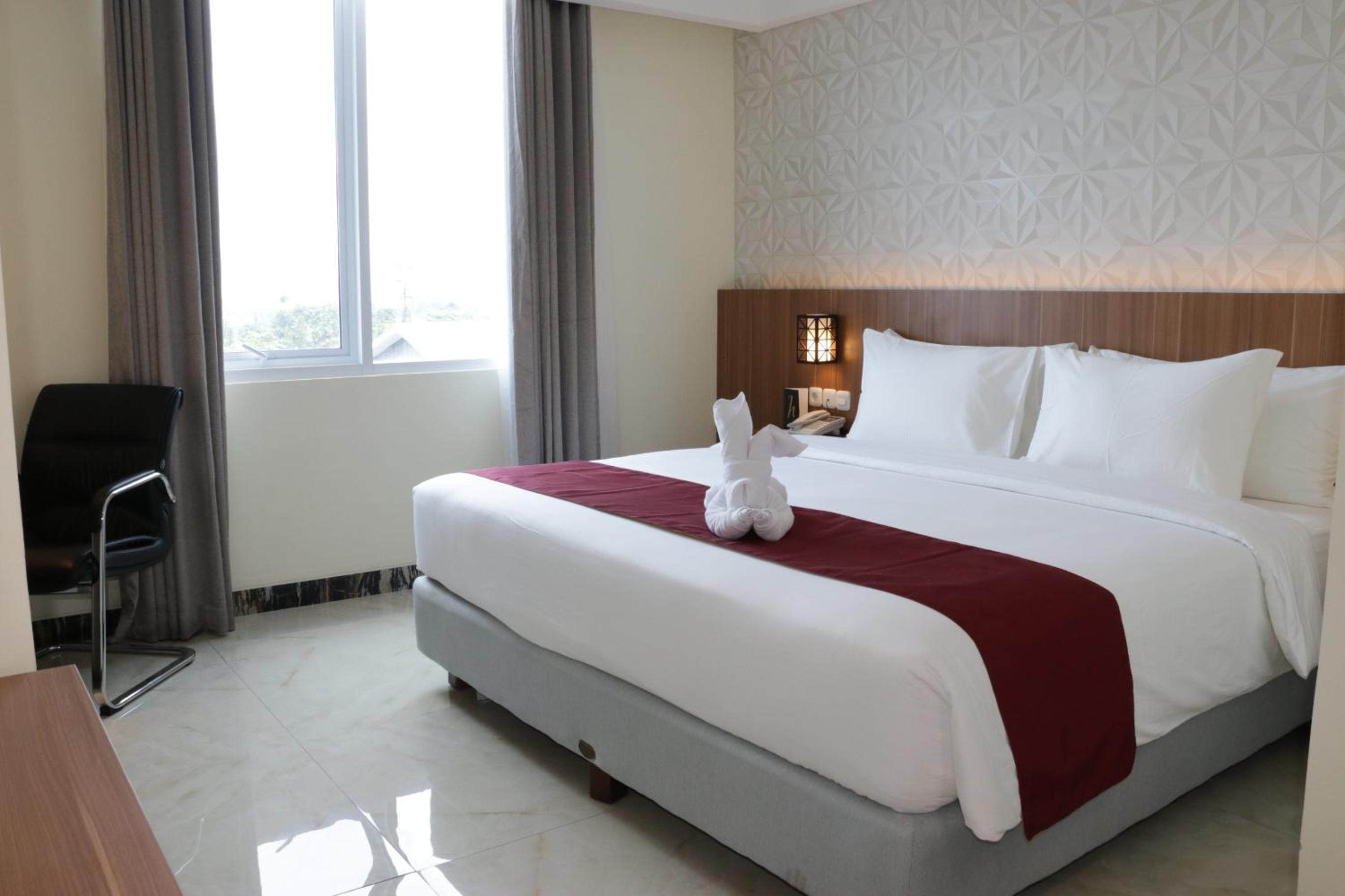 Deluxe Room - Photo 20