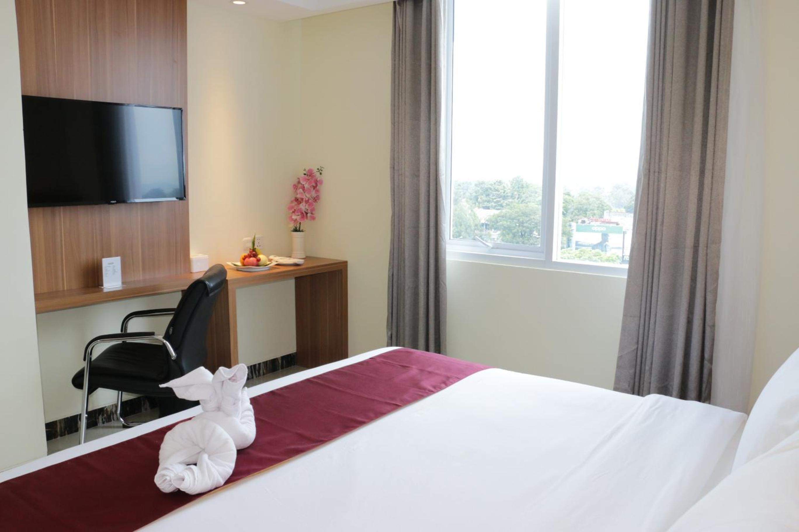 Deluxe Room - Photo 11