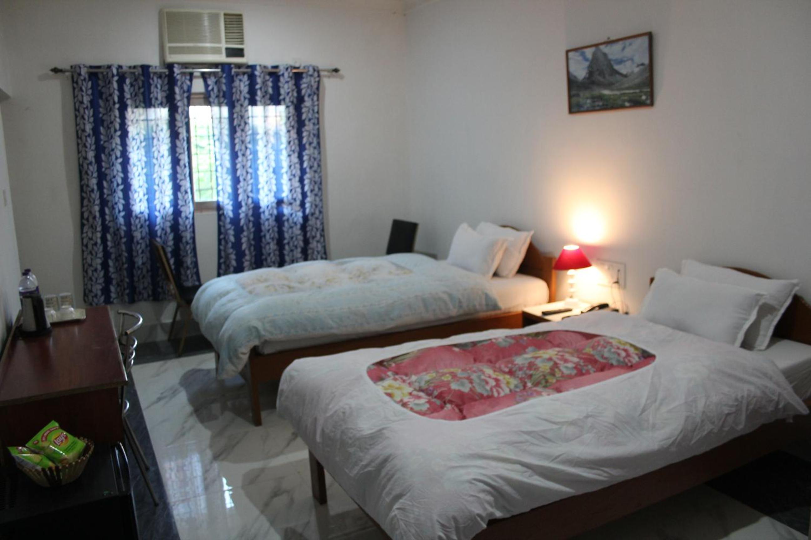Deluxe Triple Room - Photo 13
