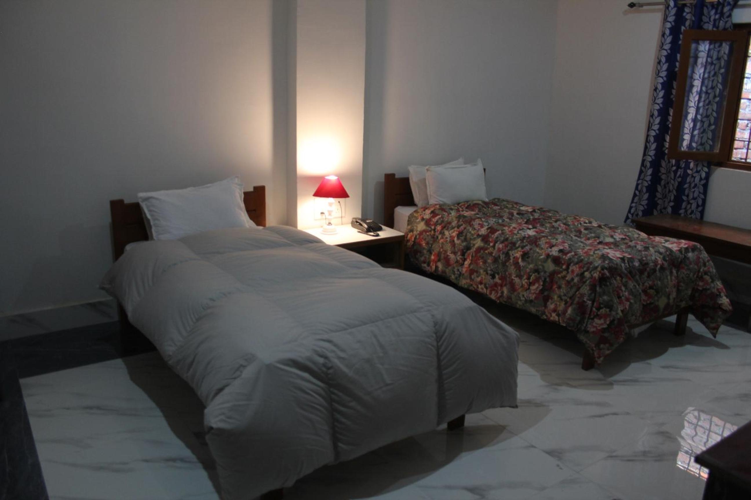 Deluxe Single Room - Photo 14