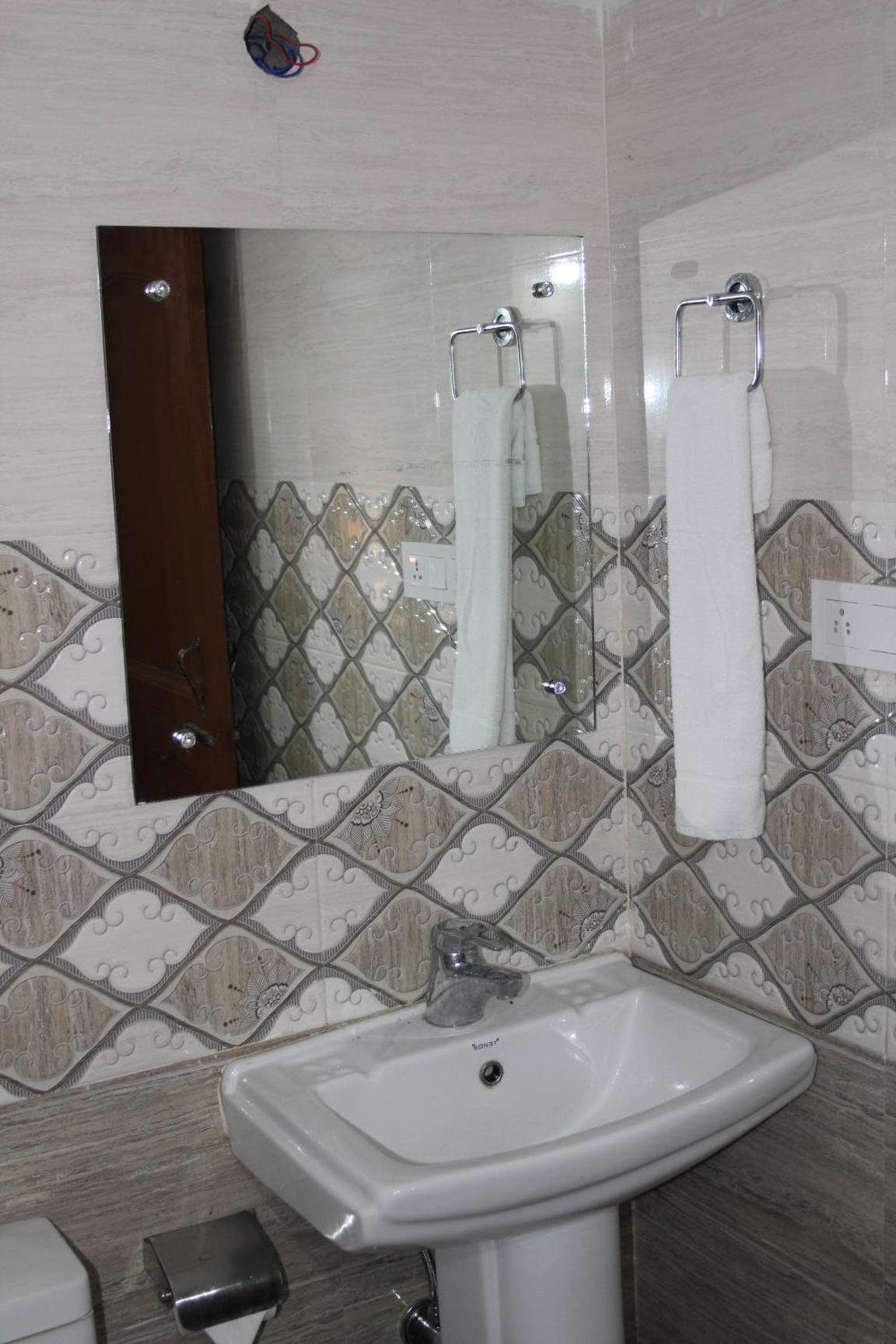 Deluxe Single Room - Photo 7