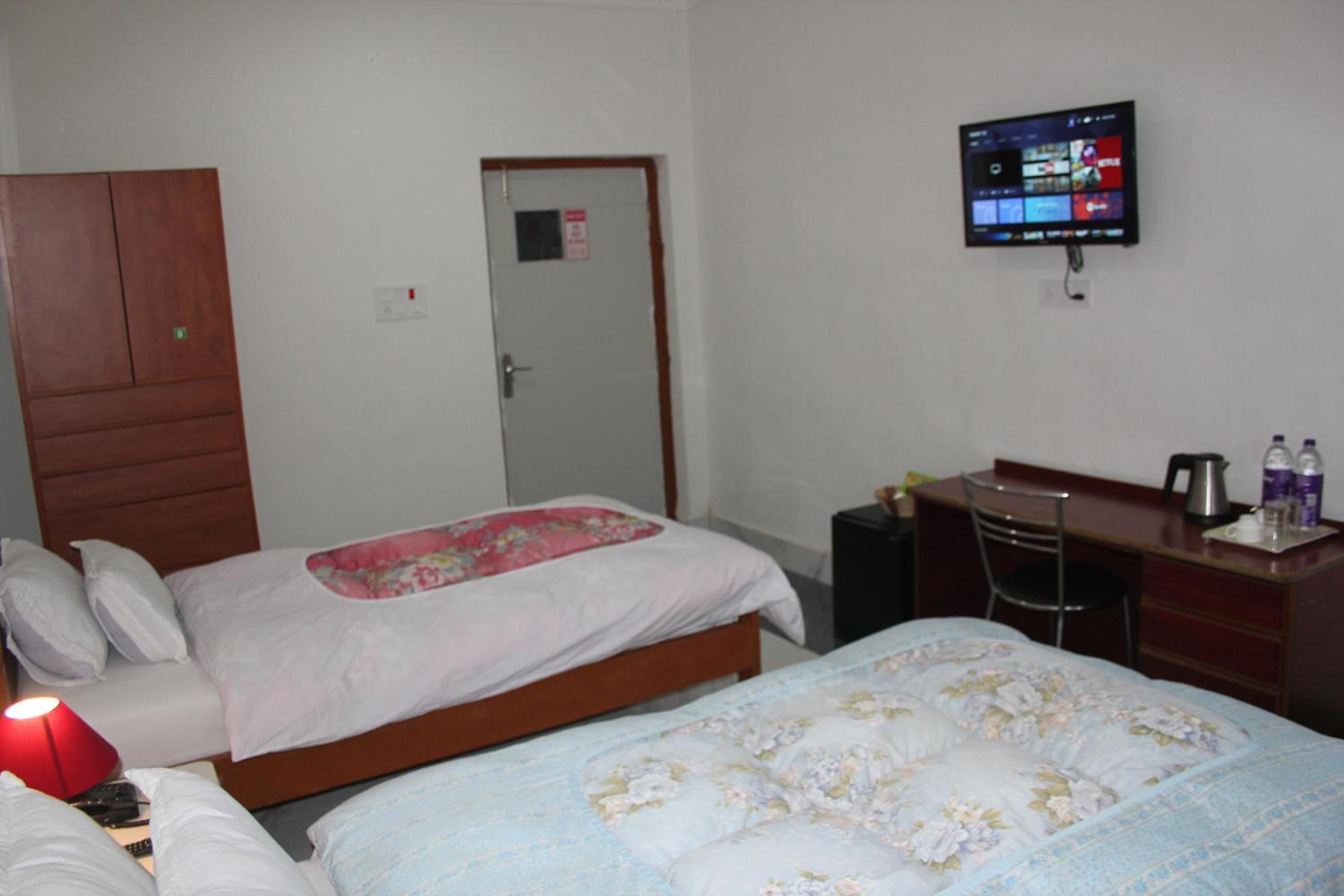 Deluxe Triple Room - Photo 21