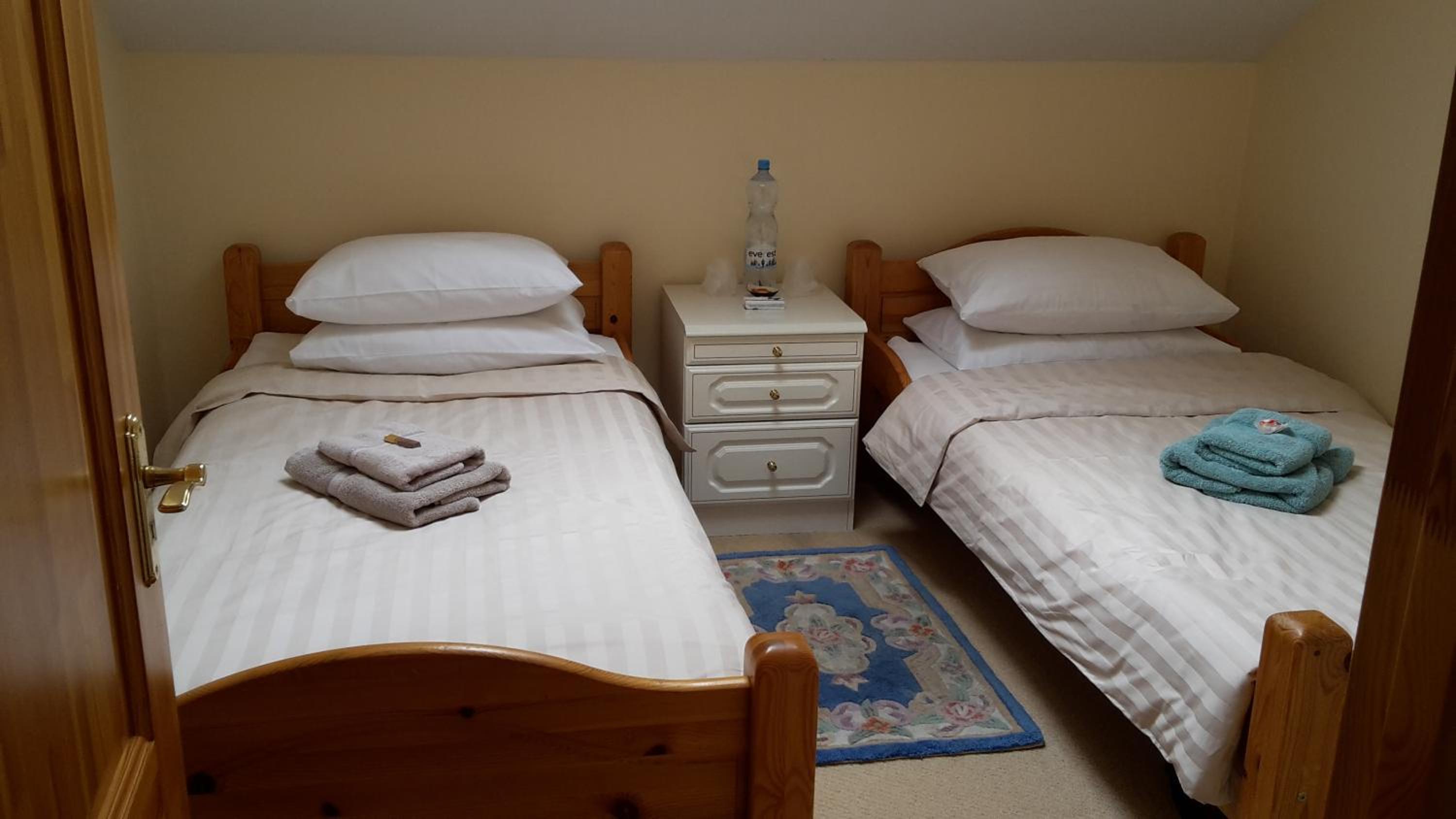Three-Bedroom House - Photo 27