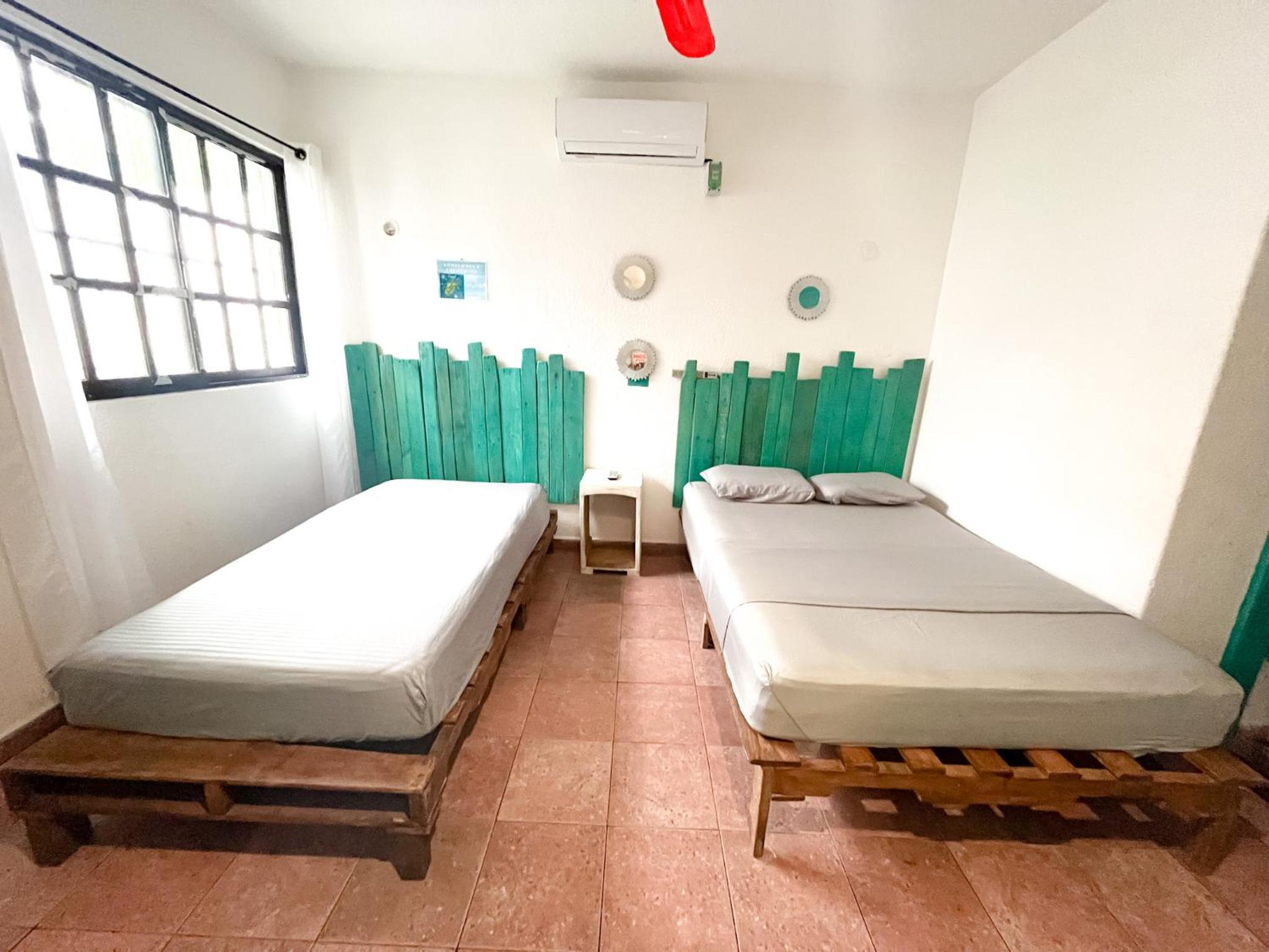 Quarto Duplo com Banheiro Compartilhado