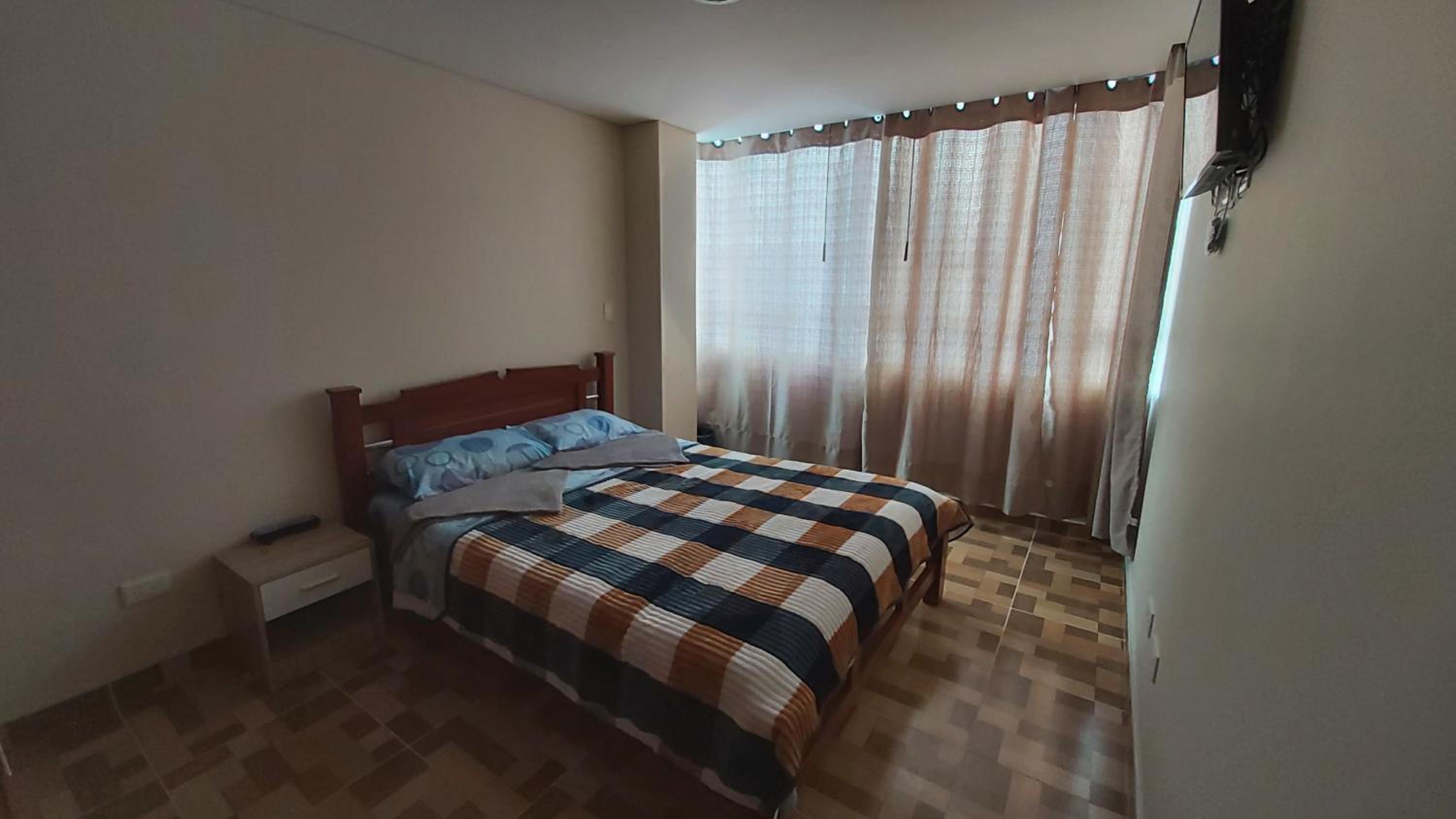Three-Bedroom Apartment photo 1