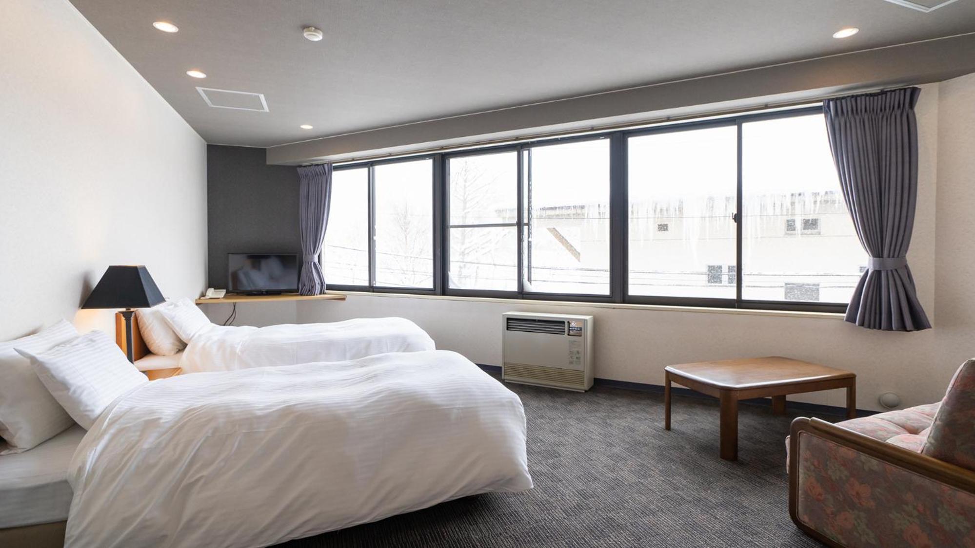 Twin Room - Photo 1