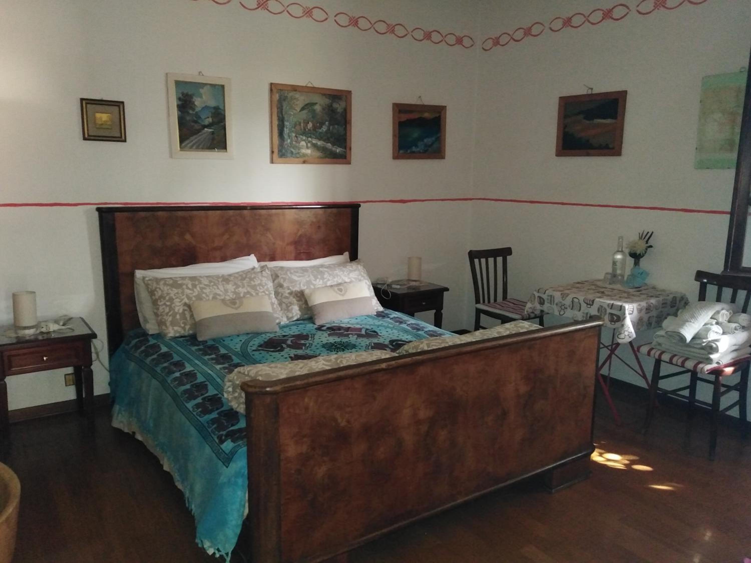 Double Room with Extra Bed and Shared Bathroom photo 1