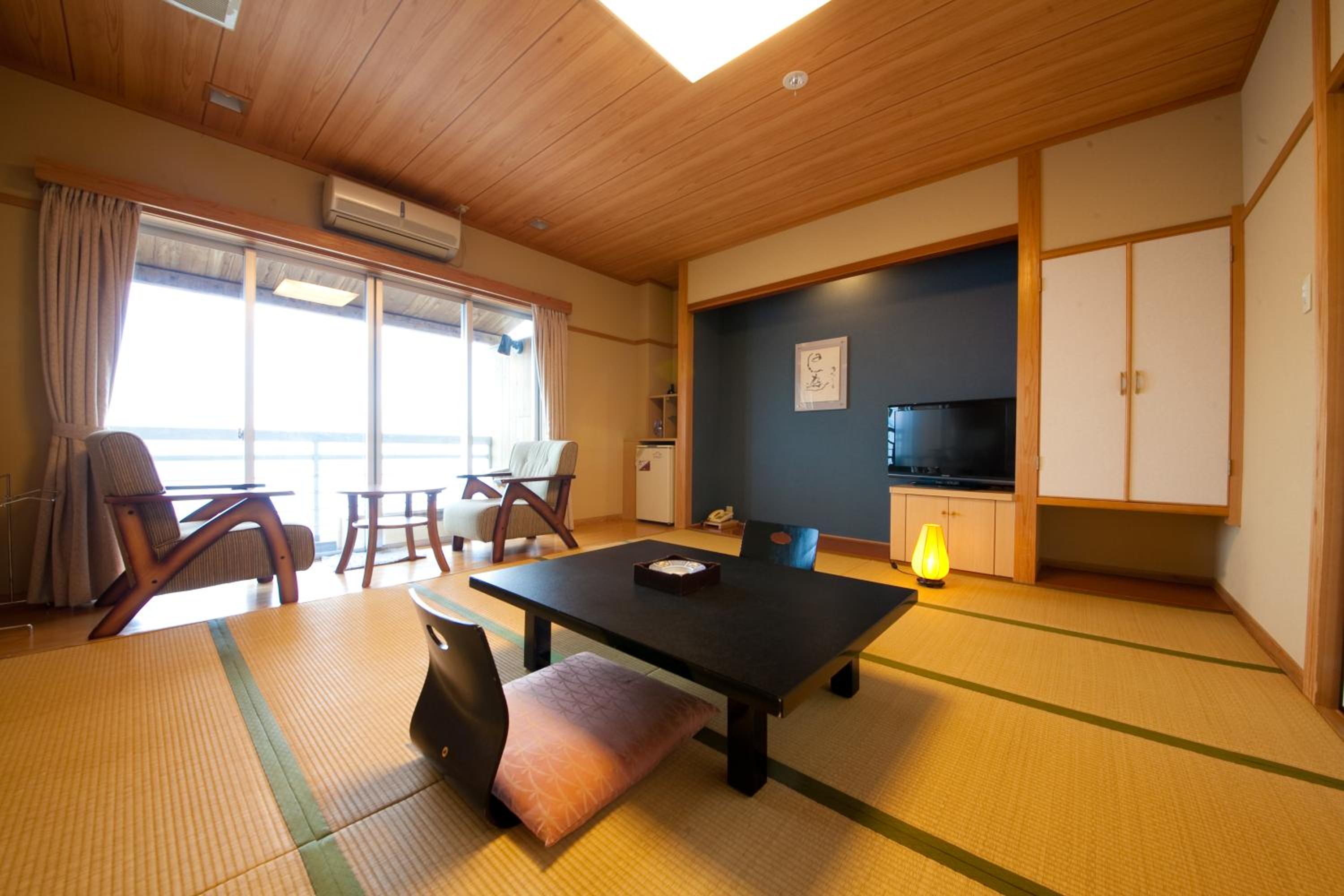 Japanese-Style Deluxe Room with Foot Bath and Sea View - Top Floor photo 3