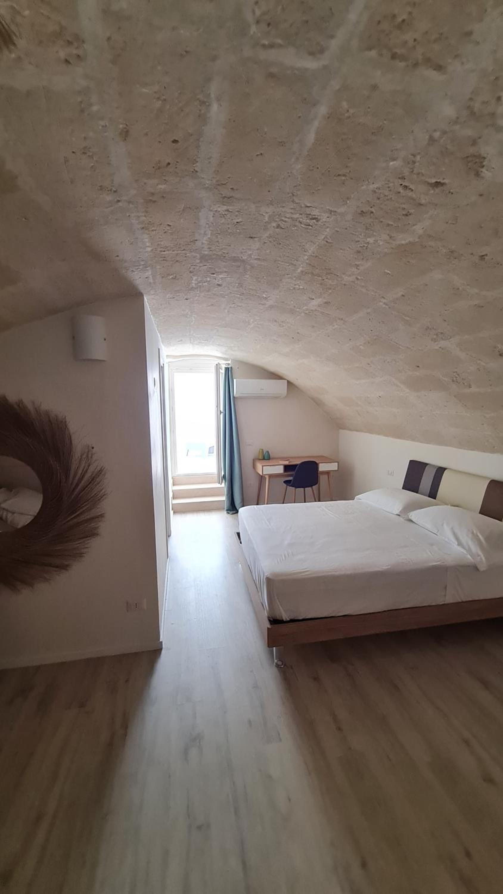 Deluxe Quadruple Room - Photo 17