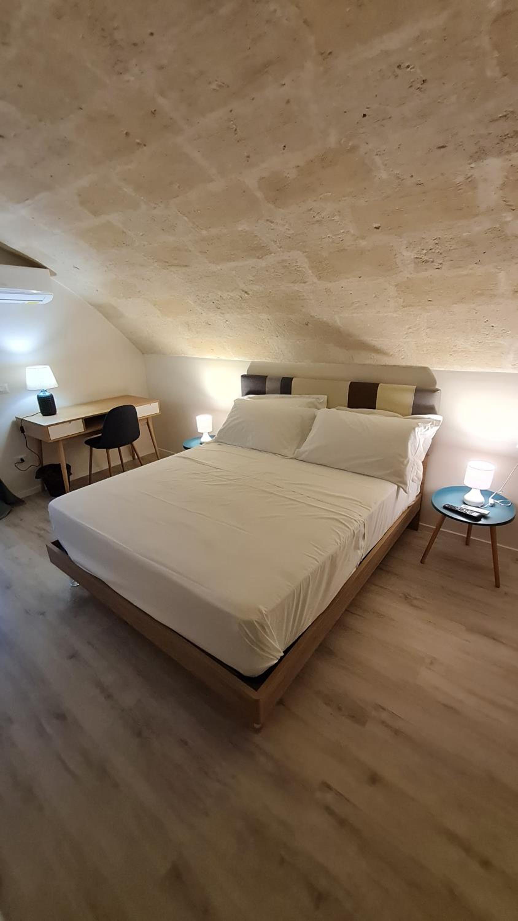 Deluxe Quadruple Room - Photo 16