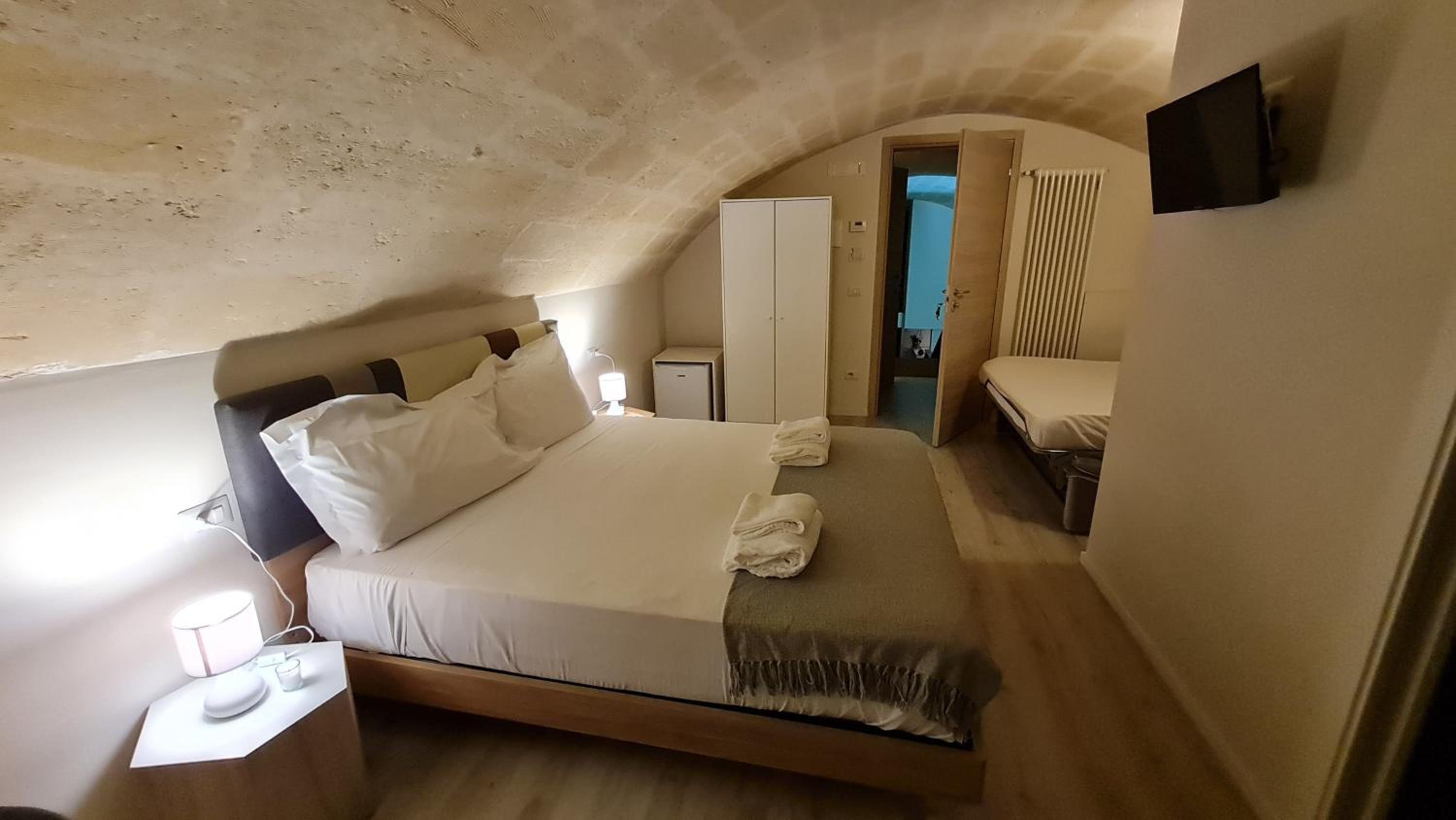 Deluxe Quadruple Room - Photo 14